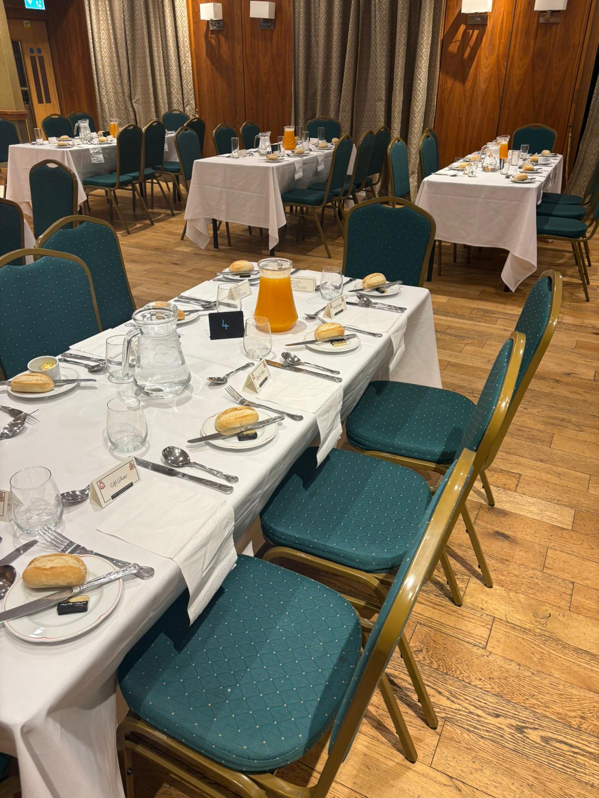 Boardroom lunch setup at Emerald Room, Emerald Venues for corporate event or meeting.