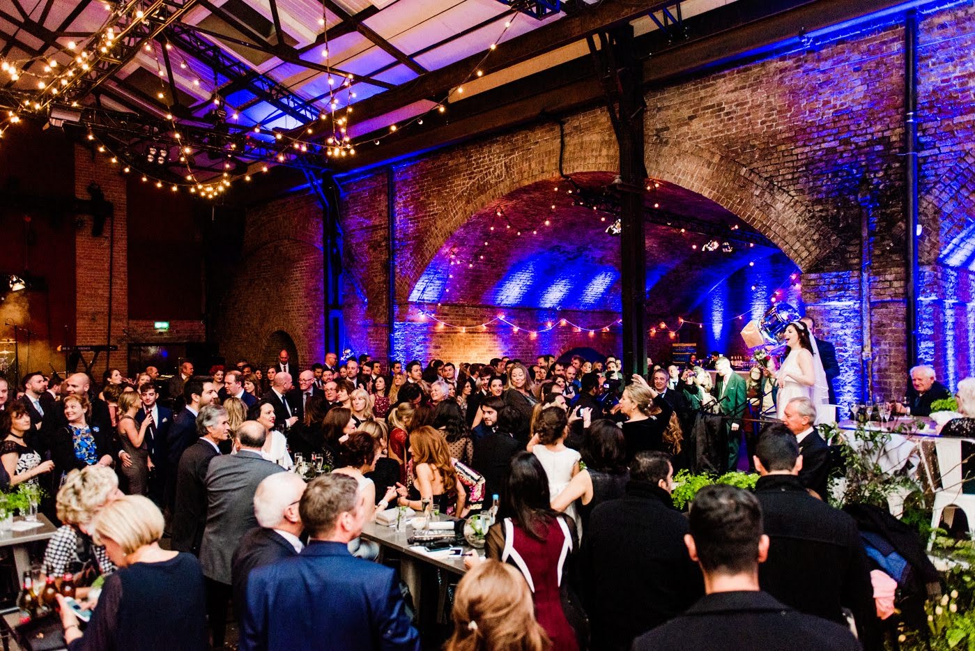 Vibrant event space at Village Underground with arched architecture for celebrations and networking.