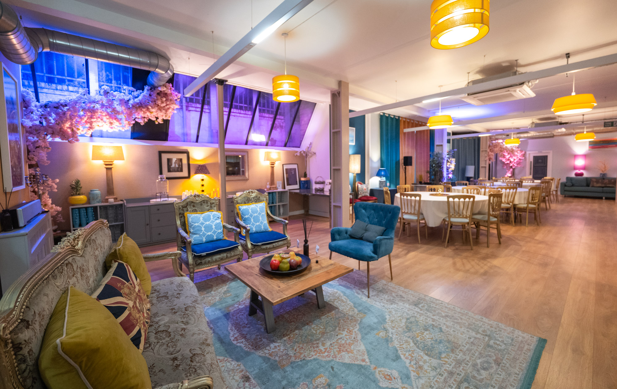 Versatile event space with cozy seating and elegant decor for gatherings and meetings.