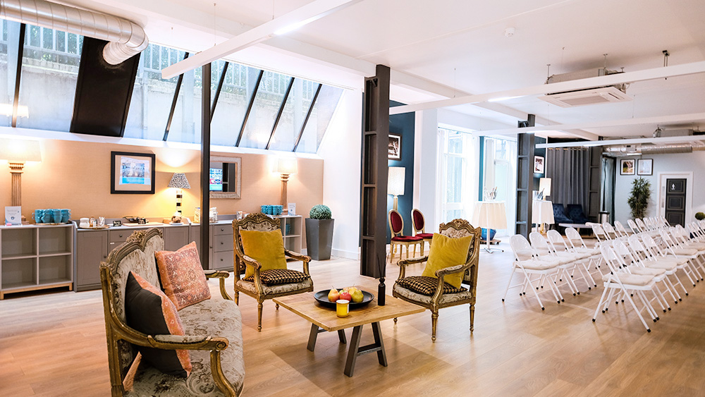 Event space at La Galeria with seating for presentations and networking in natural light.