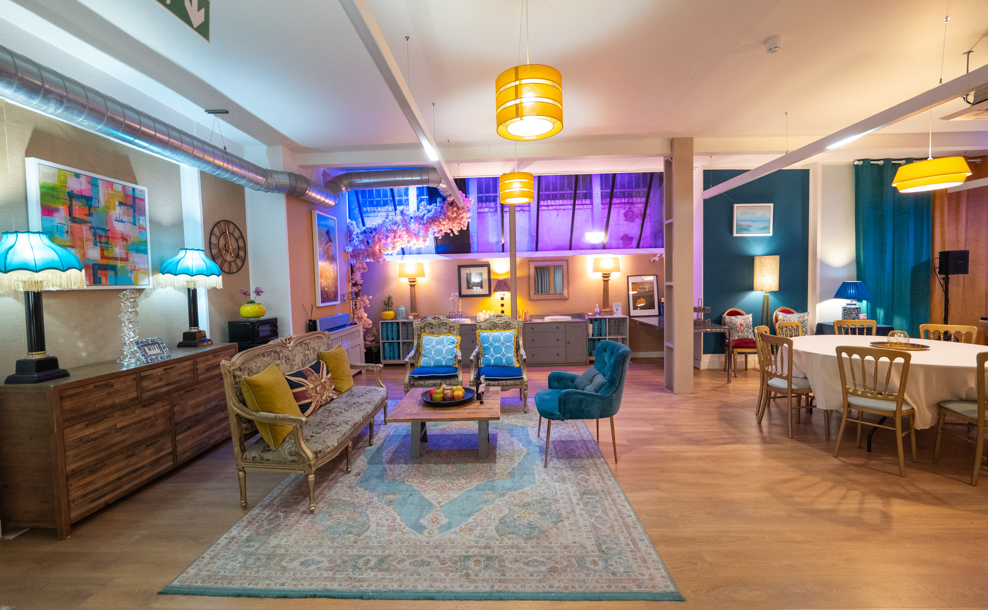 Versatile event space with cozy seating for meetings and social gatherings in Lumiere Underwood.