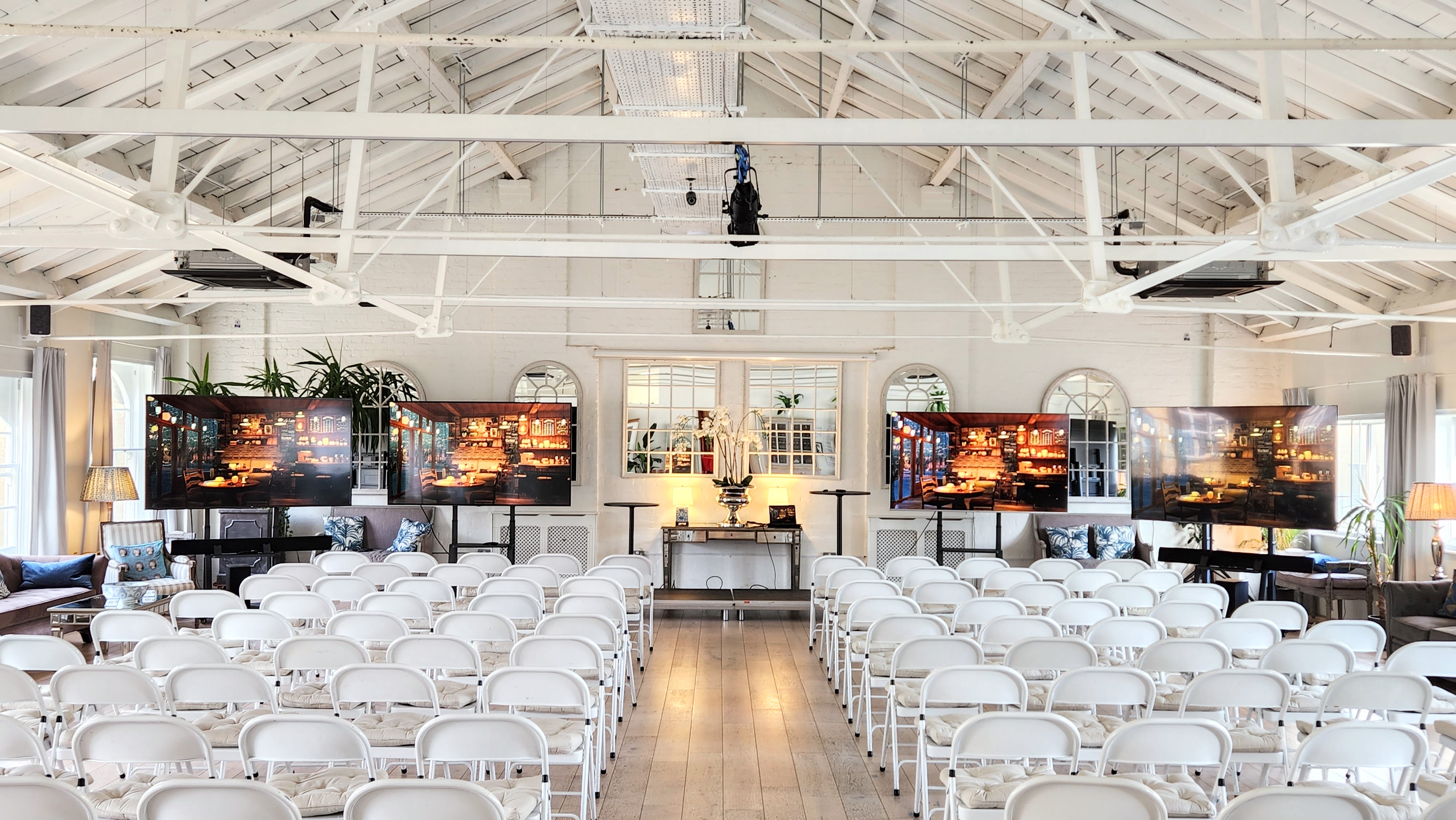 Underwood Flagship Venue with white chairs, ideal for corporate events and workshops.