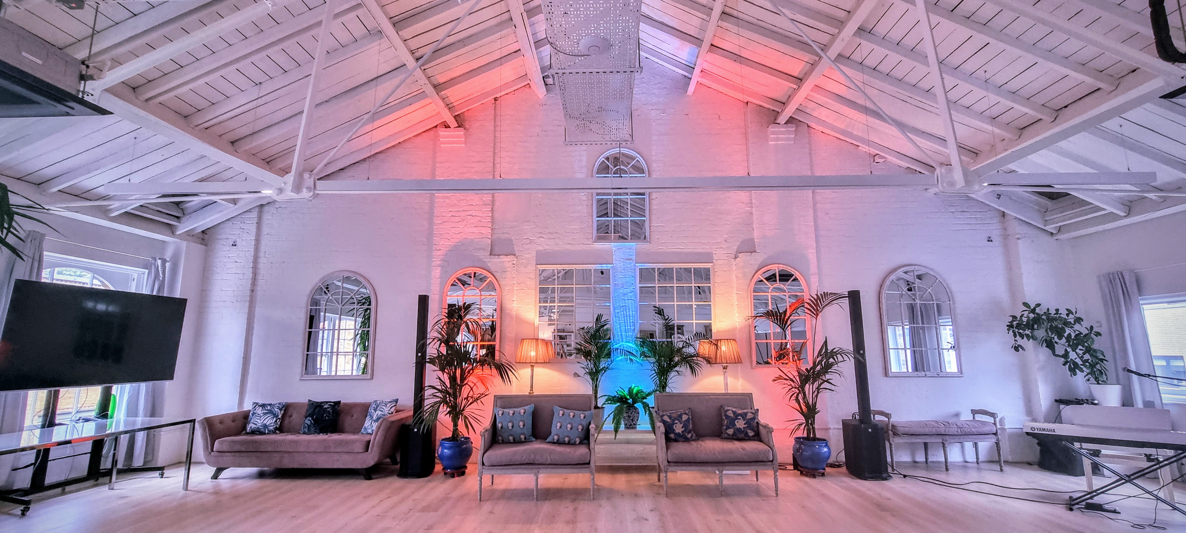 Underwood Flagship Venue: stylish event space with beamed ceiling, ideal for gatherings.