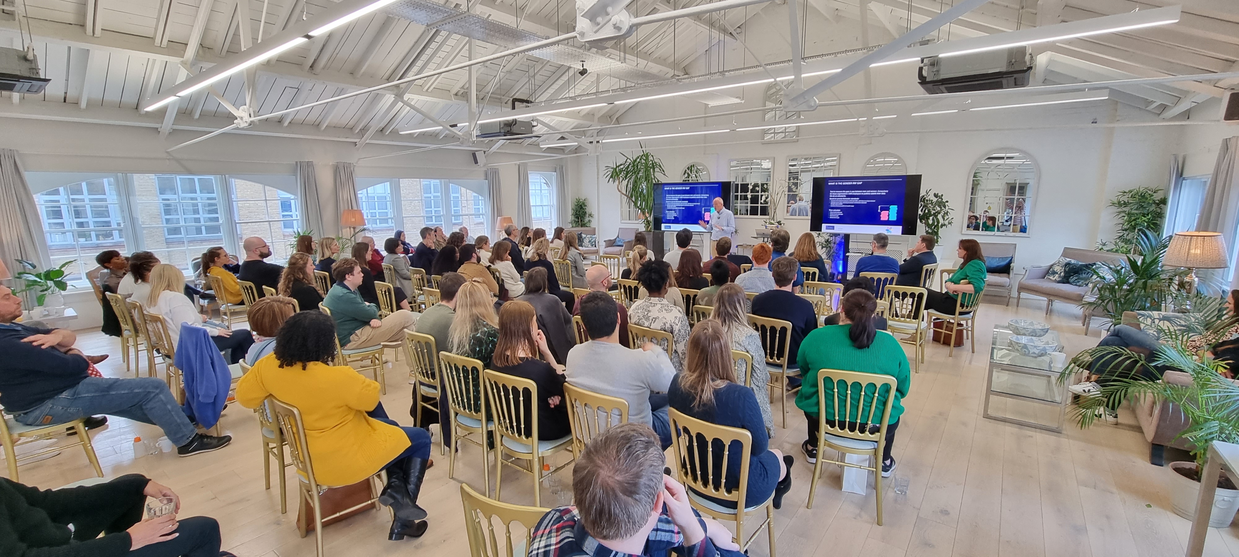 Underwood Flagship Venue conference with professional speaker and engaged audience, ideal for networking.