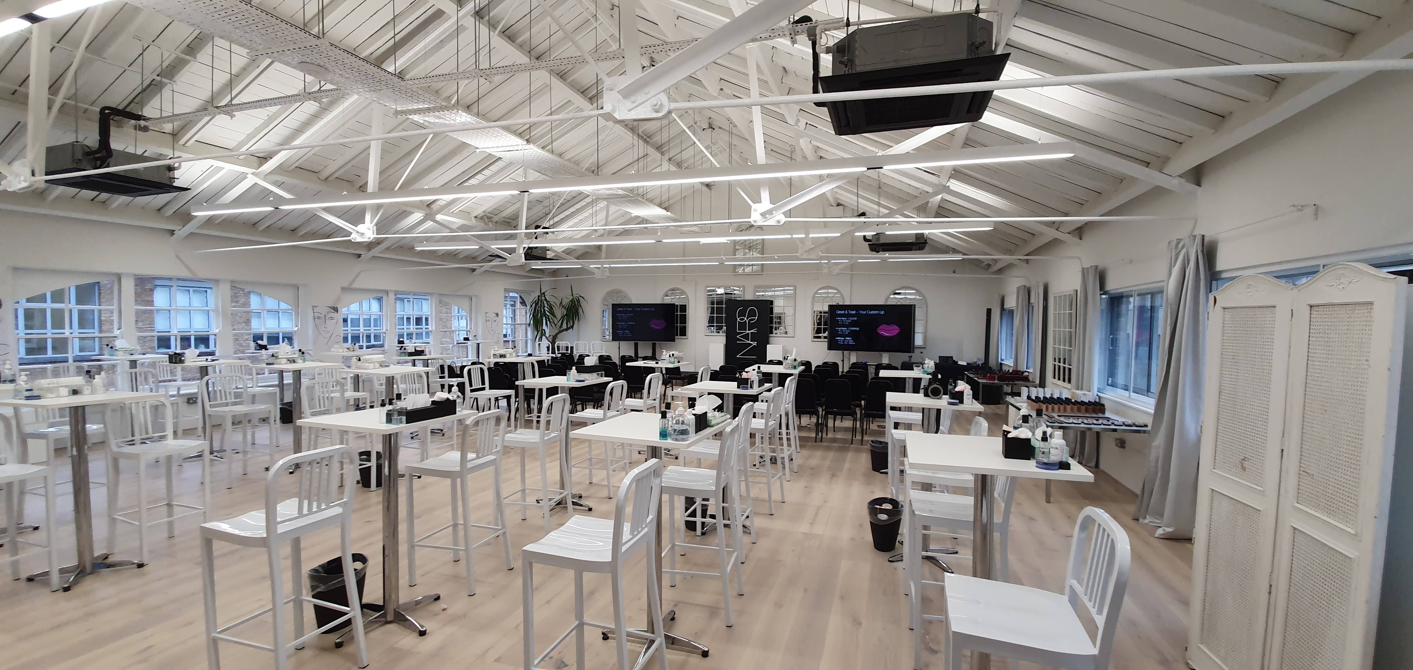 Underwood Flagship Venue with high tables for modern meetings and events.