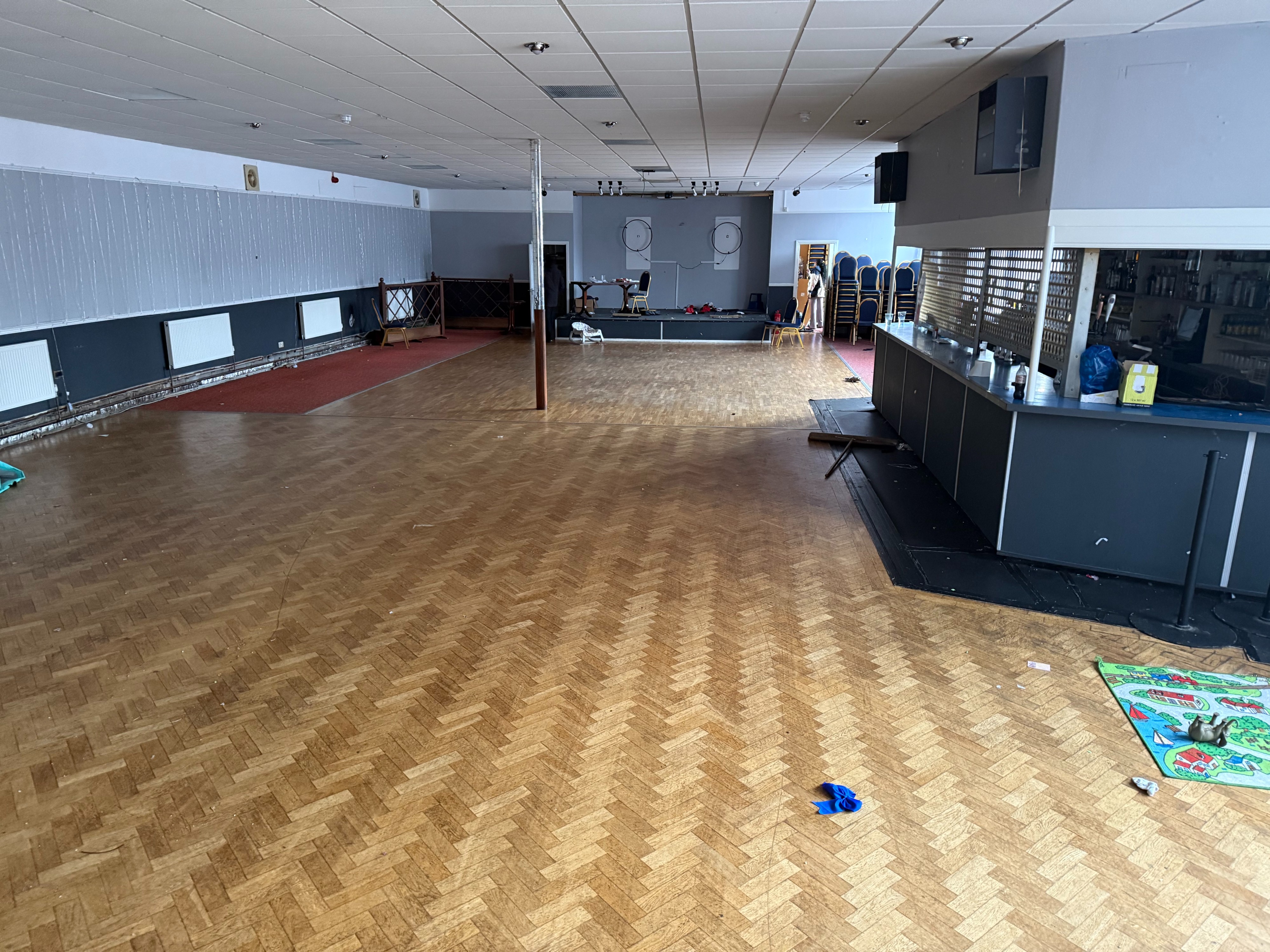 Ballroom event space in Dartford Conservative Club, requires staging for corporate functions.
