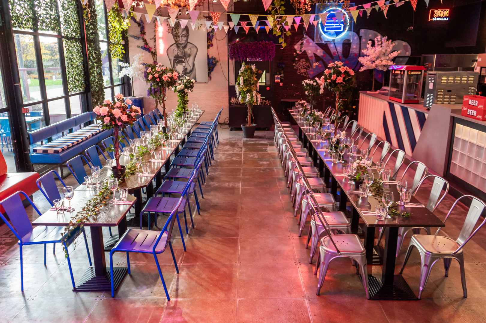 Whole Venue Hire in HUCKSTER London set up for elegant dining experience with vibrant decor.