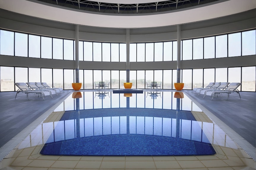 Luxurious meeting room with floor-to-ceiling windows at Courtyard Riyadh for events.