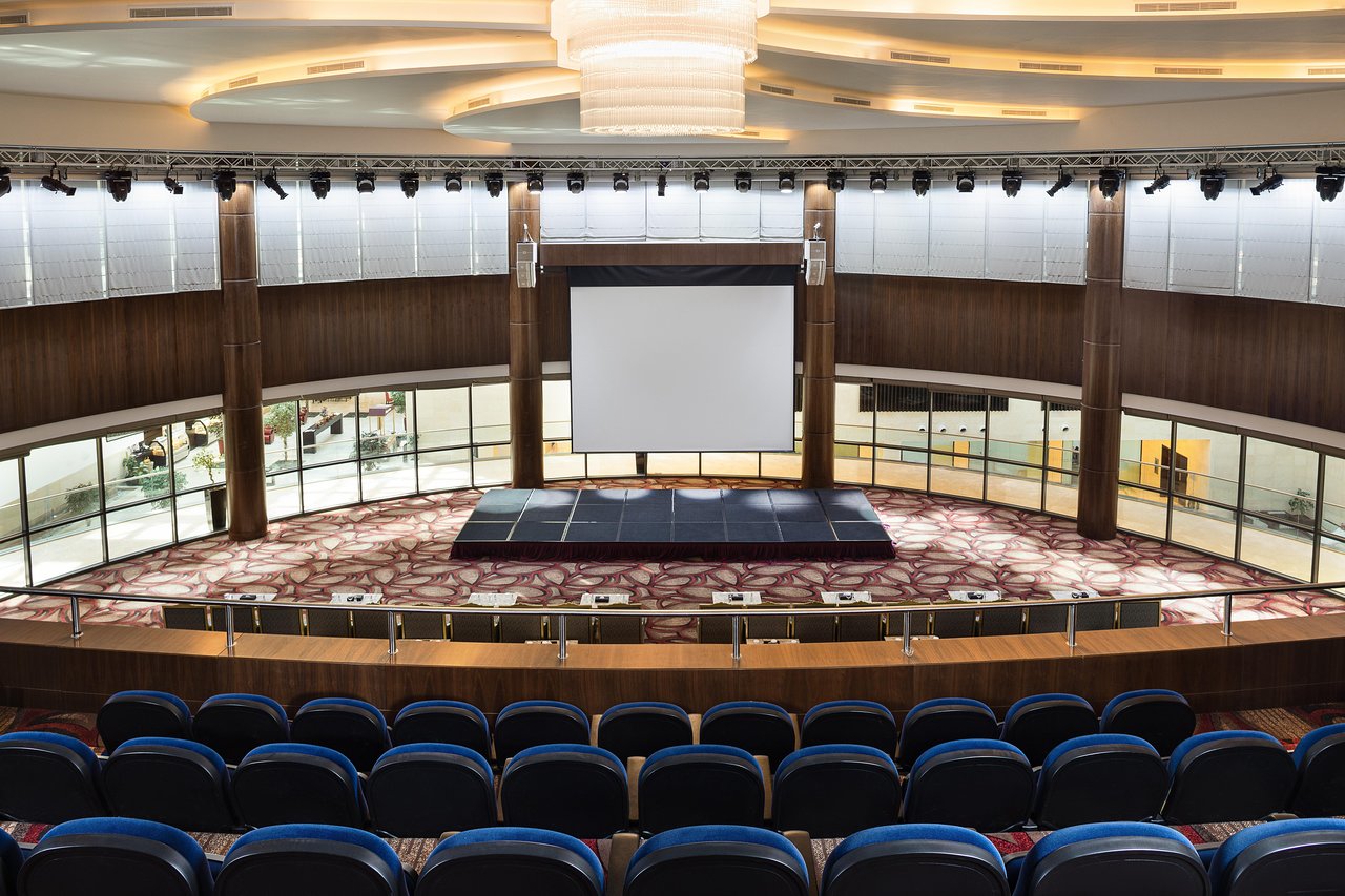 Sultana Ballroom at Crowne Plaza Riyadh with tiered seating for conferences and meetings.