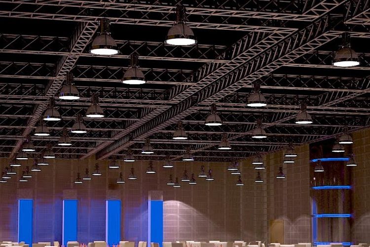 Ibn Batouta event venue at Crowne Plaza Riyadh, featuring industrial design and high ceiling.