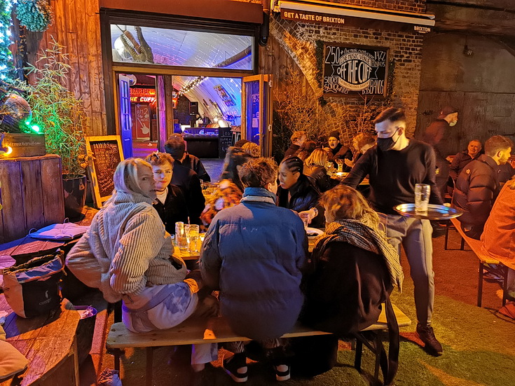 Rustic live music bar with outdoor seating for events and social gatherings.