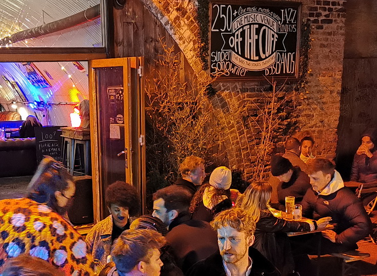 Rustic live music bar for post-conference networking and corporate events.