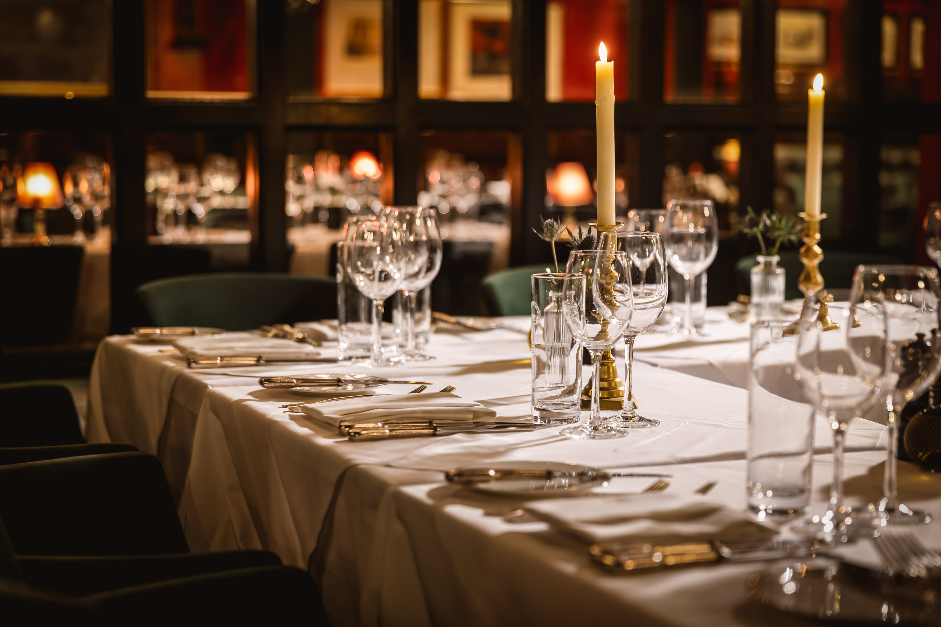 Elegant dining setup with white linens for intimate events at Boisdale of Belgravia.
