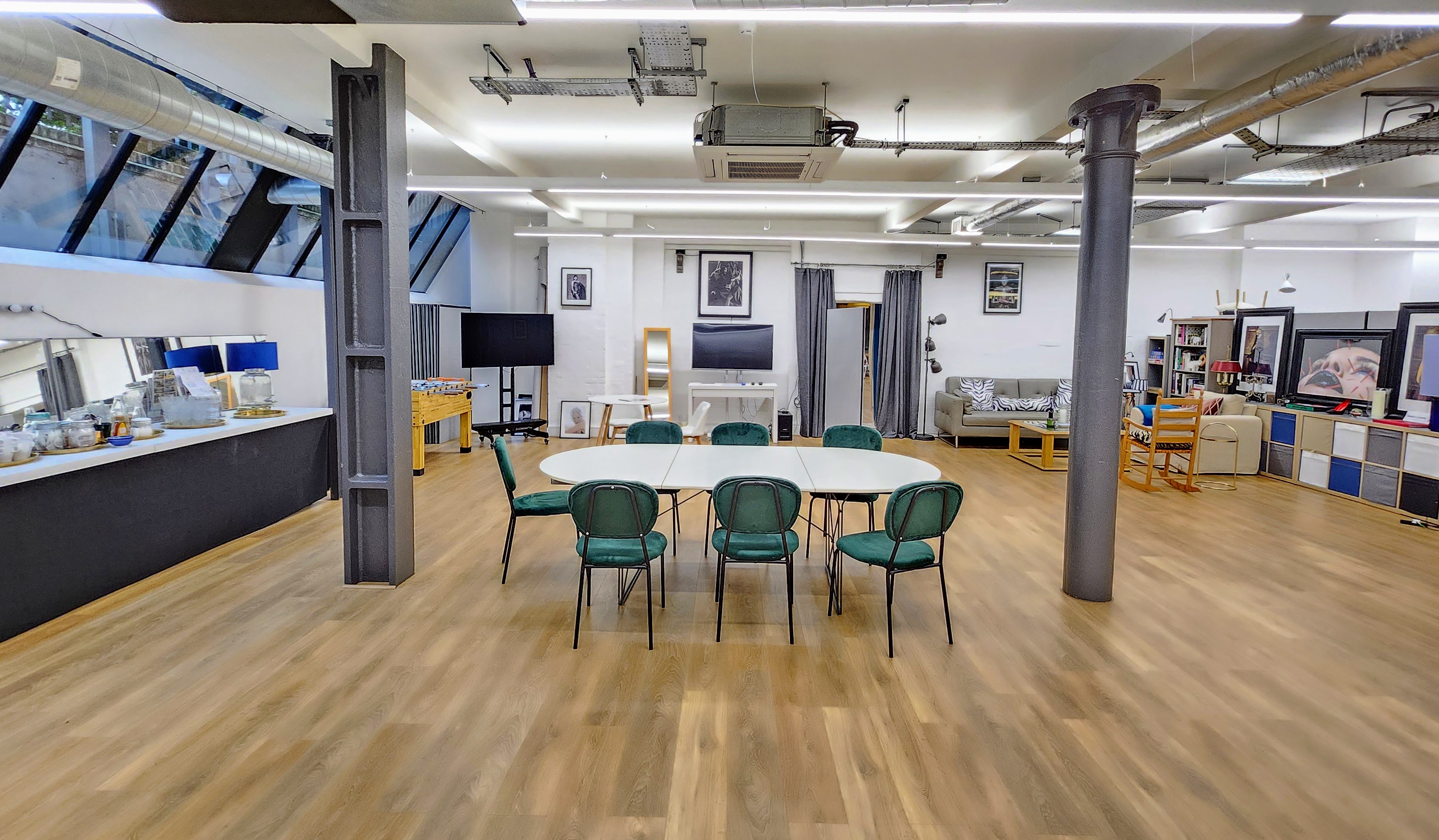 Versatile event space with round table for meetings and workshops in Lumiere Underwood.