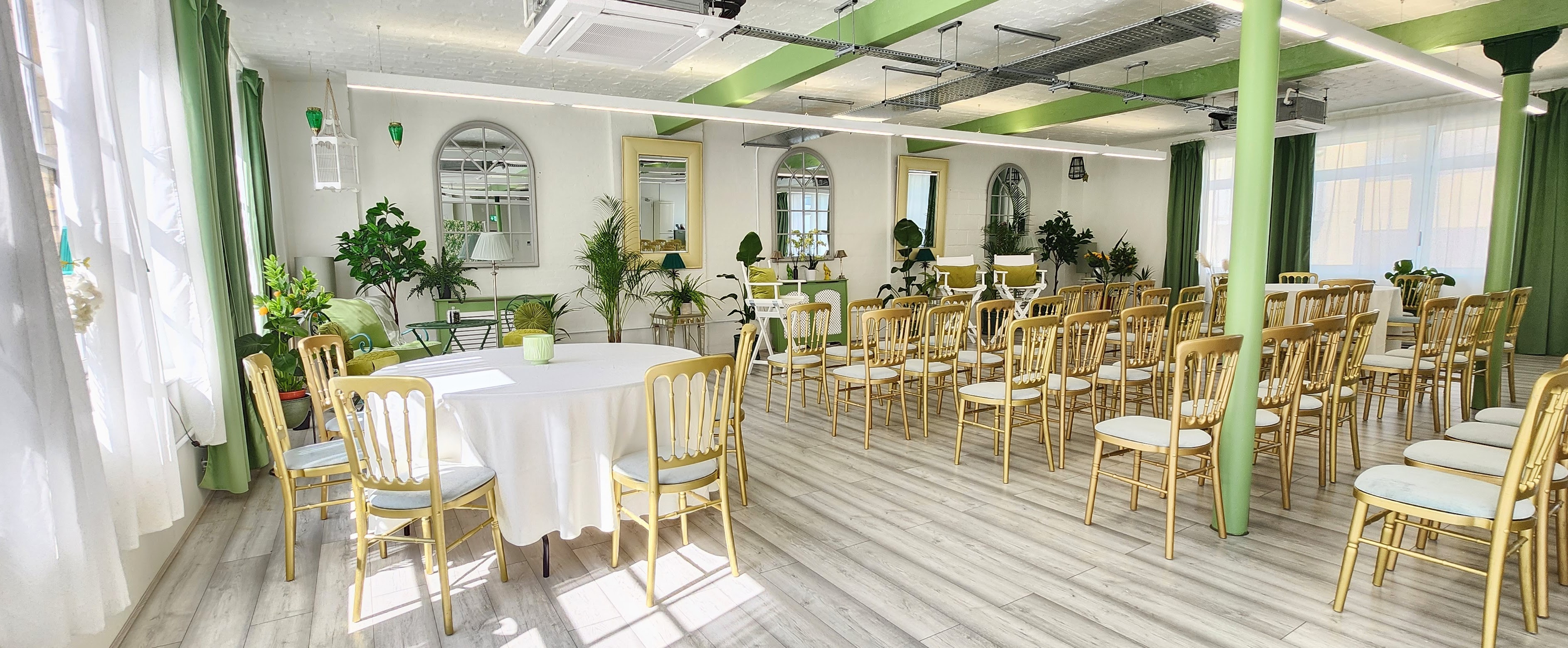 Lumiere Underwood's modern event space with greenery for workshops and gatherings.