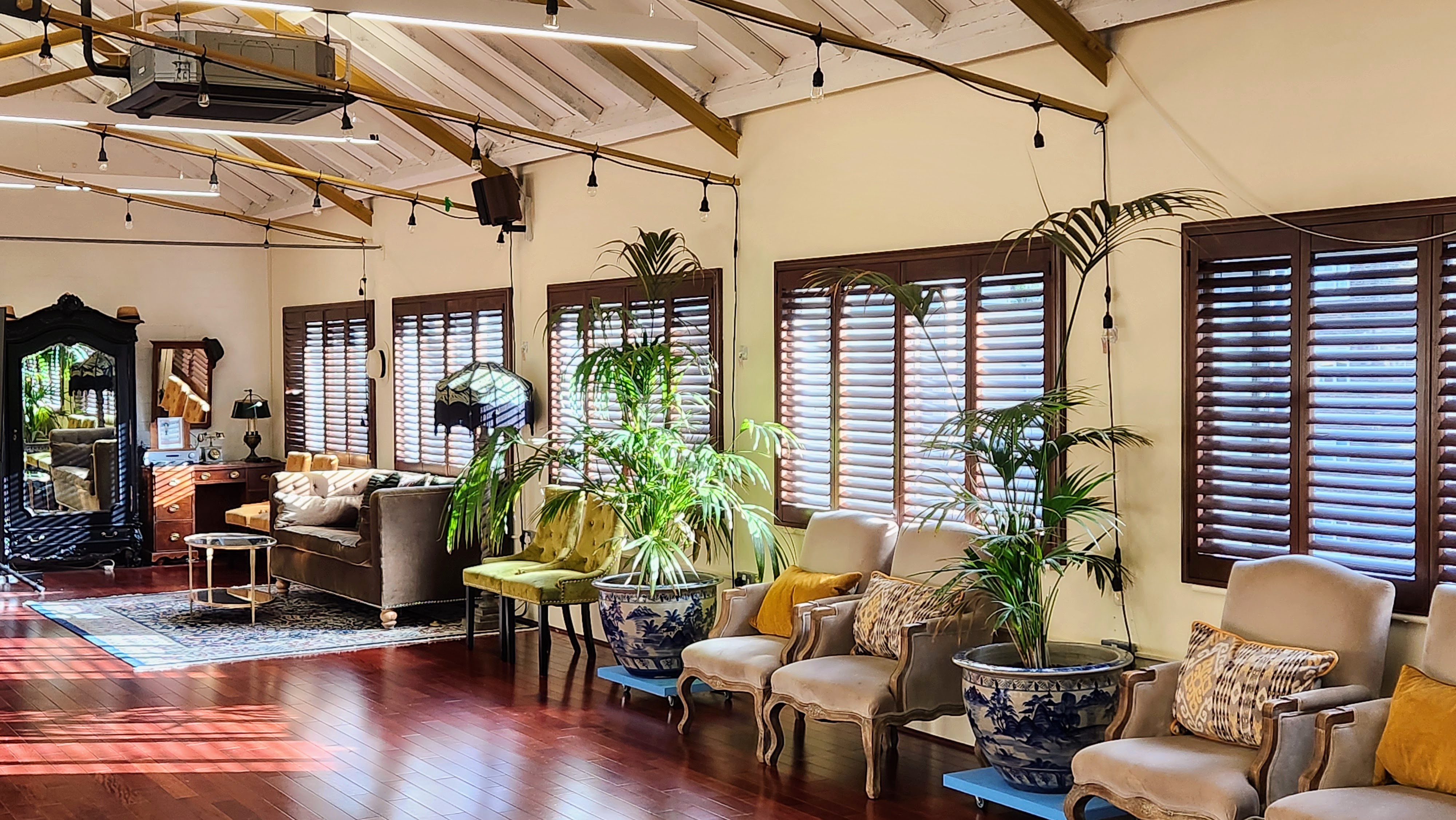 Elegant meeting space in New Victorian Loft with wooden floors for events and gatherings.