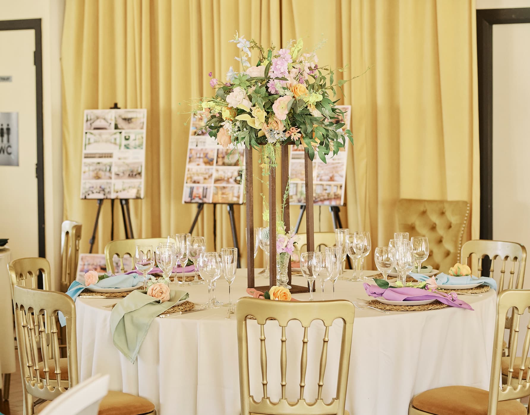 New Victorian Loft event venue with floral centerpiece, perfect for wedding showcase or design expo.