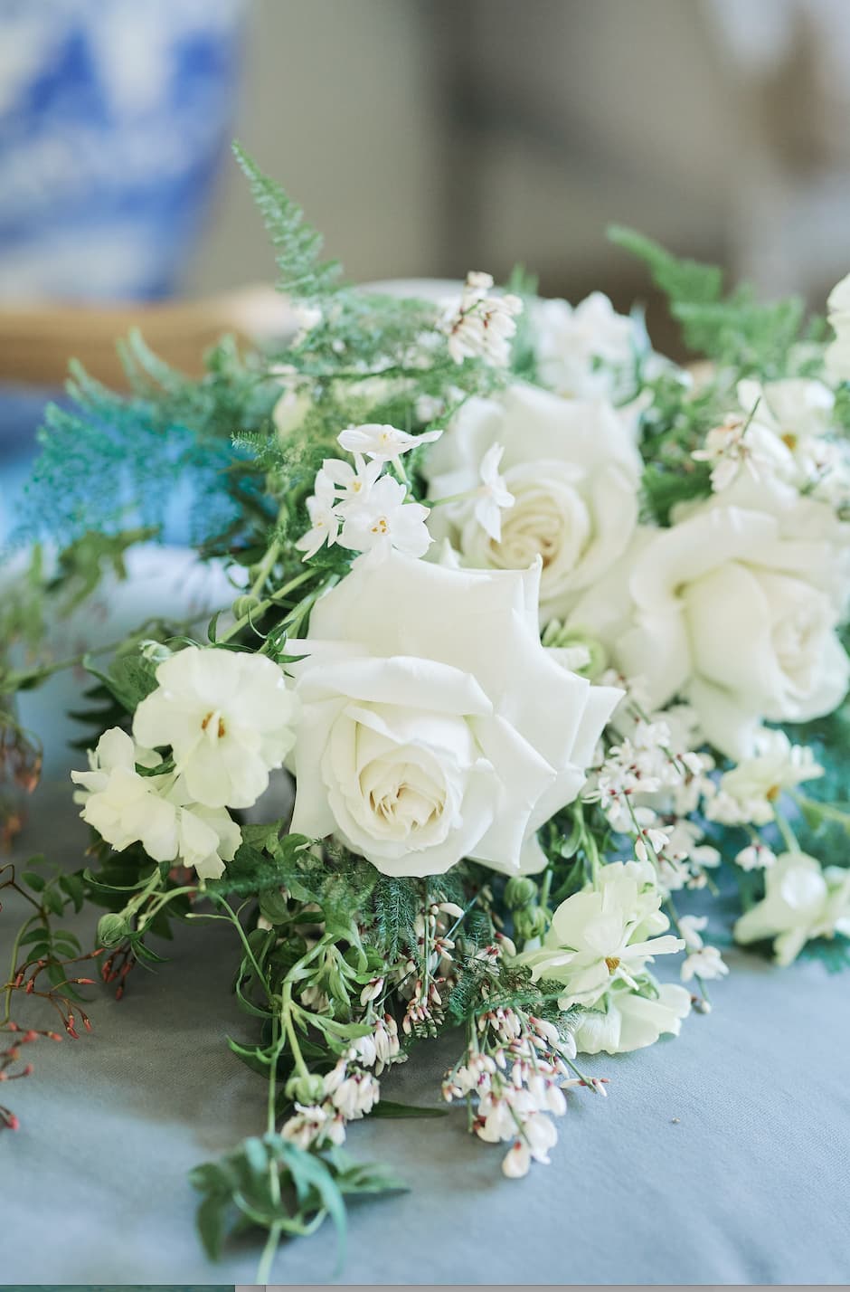 White rose floral centerpiece at New Victorian Loft gala, perfect for luxury wedding decor.