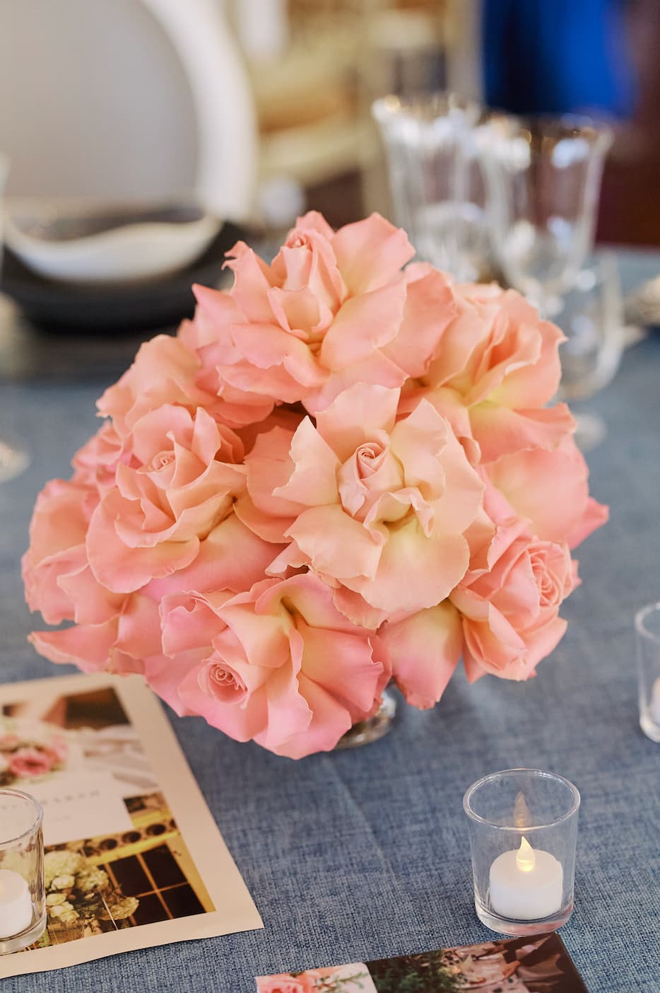 Peach rose floral centerpiece at New Victorian Loft for elegant wedding and event table decor.