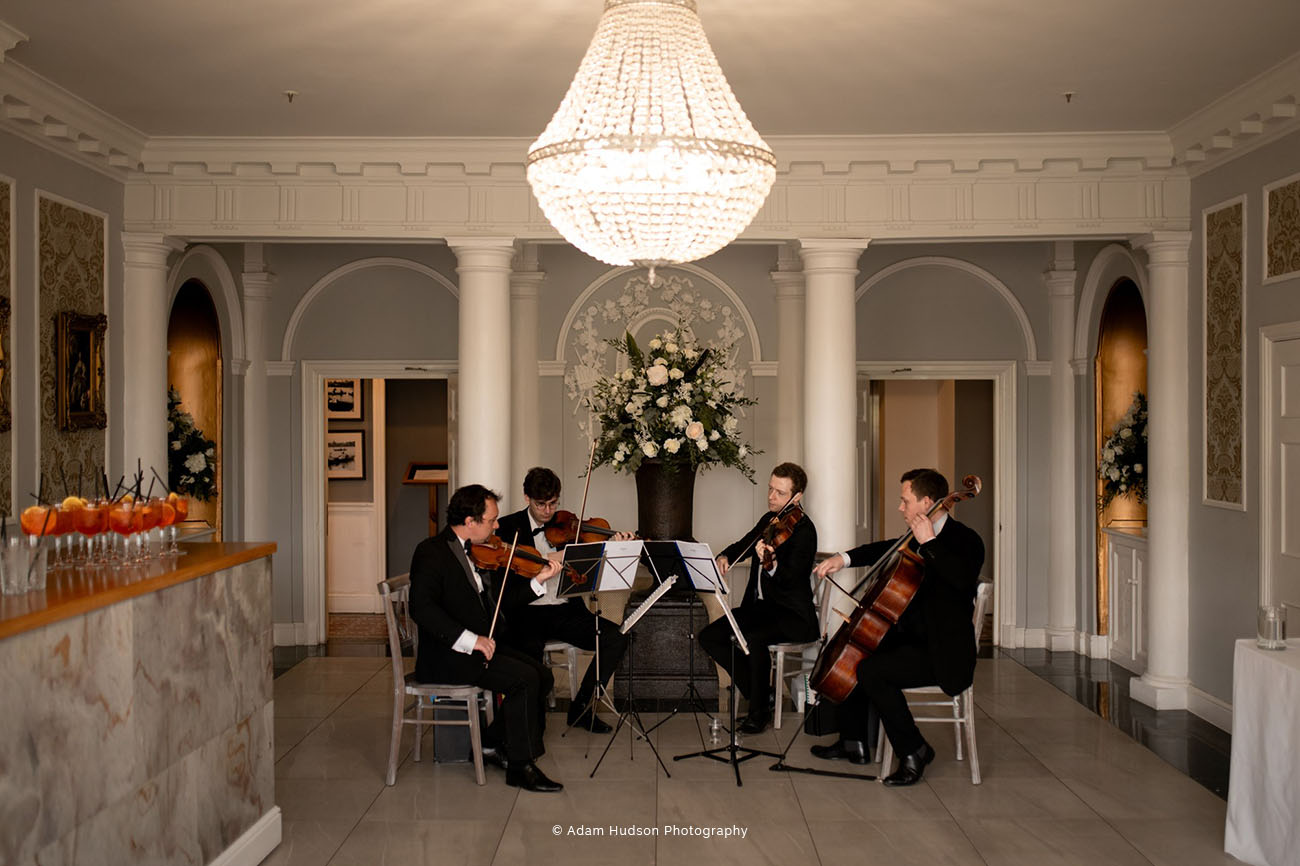 Elegant Arrival Hall in Old Palace Chester with string quartet for upscale weddings and events.