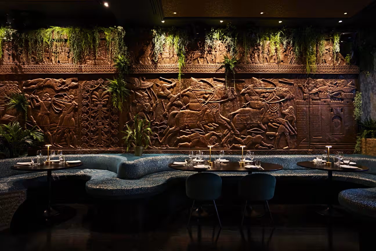 Zion- Mezzanine restaurant in Gilgamesh London with carved wall, perfect for intimate events.