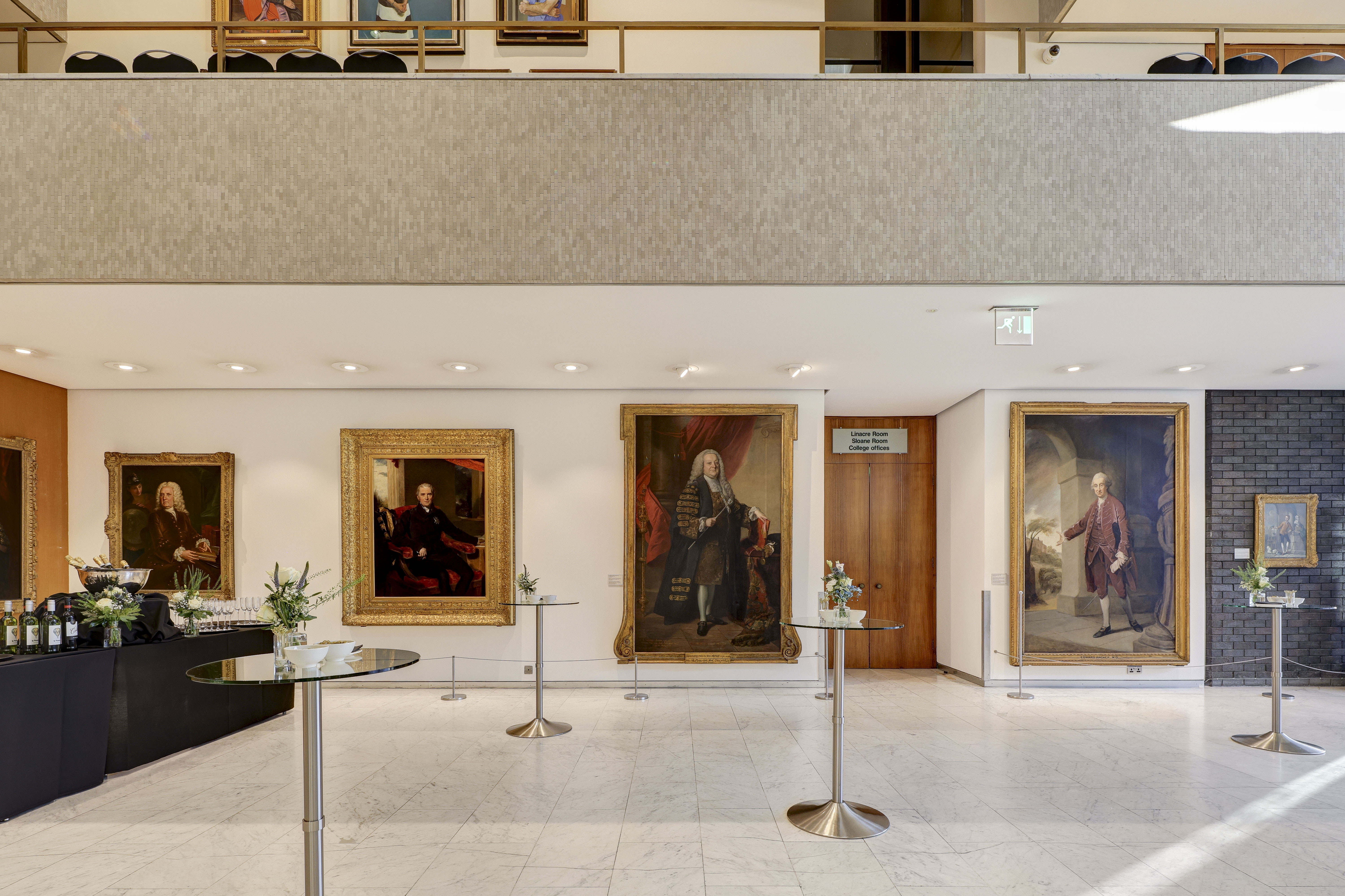 Filming at RCP London Events, elegant cocktail tables in a sophisticated venue.