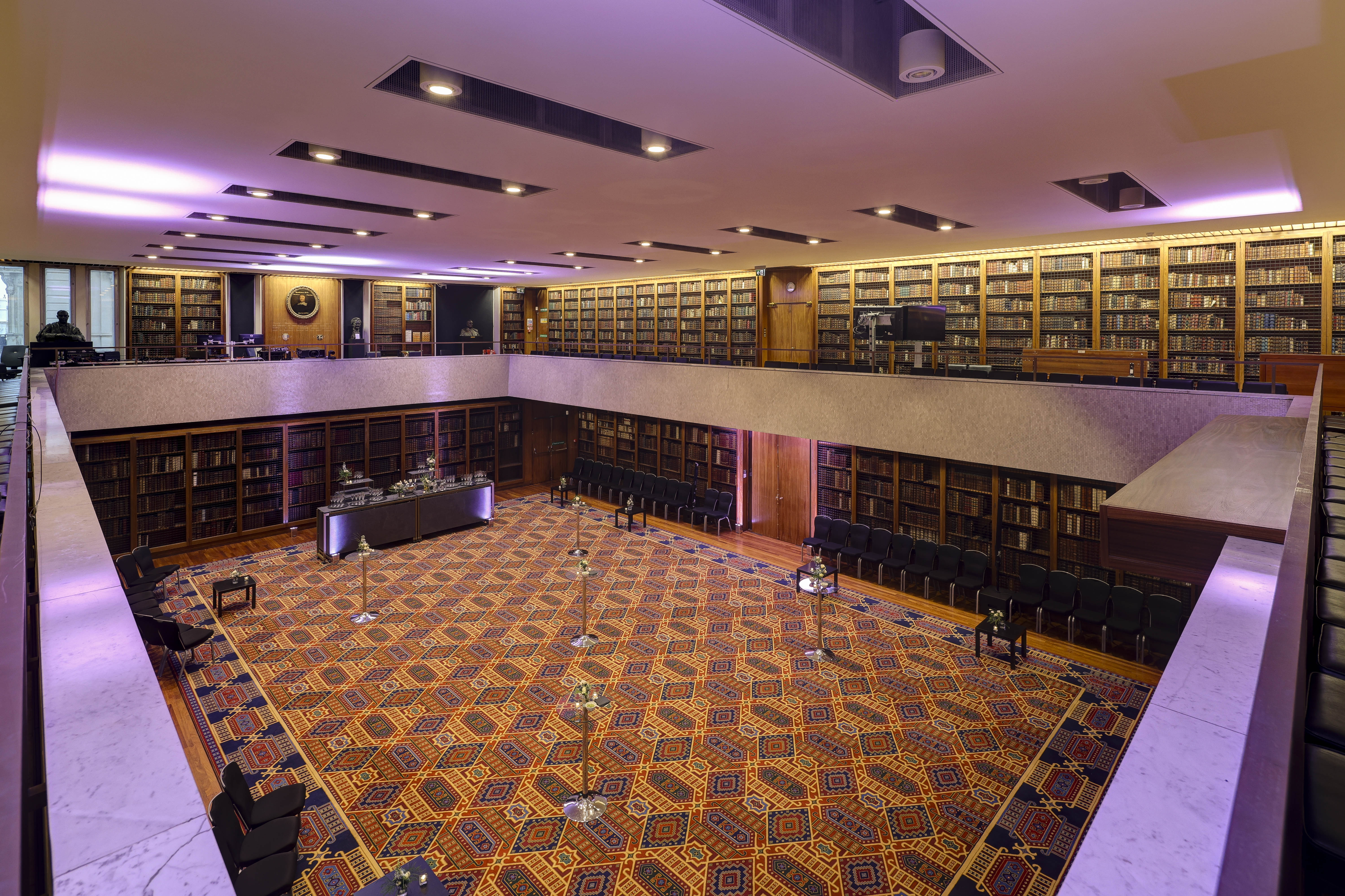 Filming in RCP London Events library, featuring high ceilings and elegant decor for meetings.