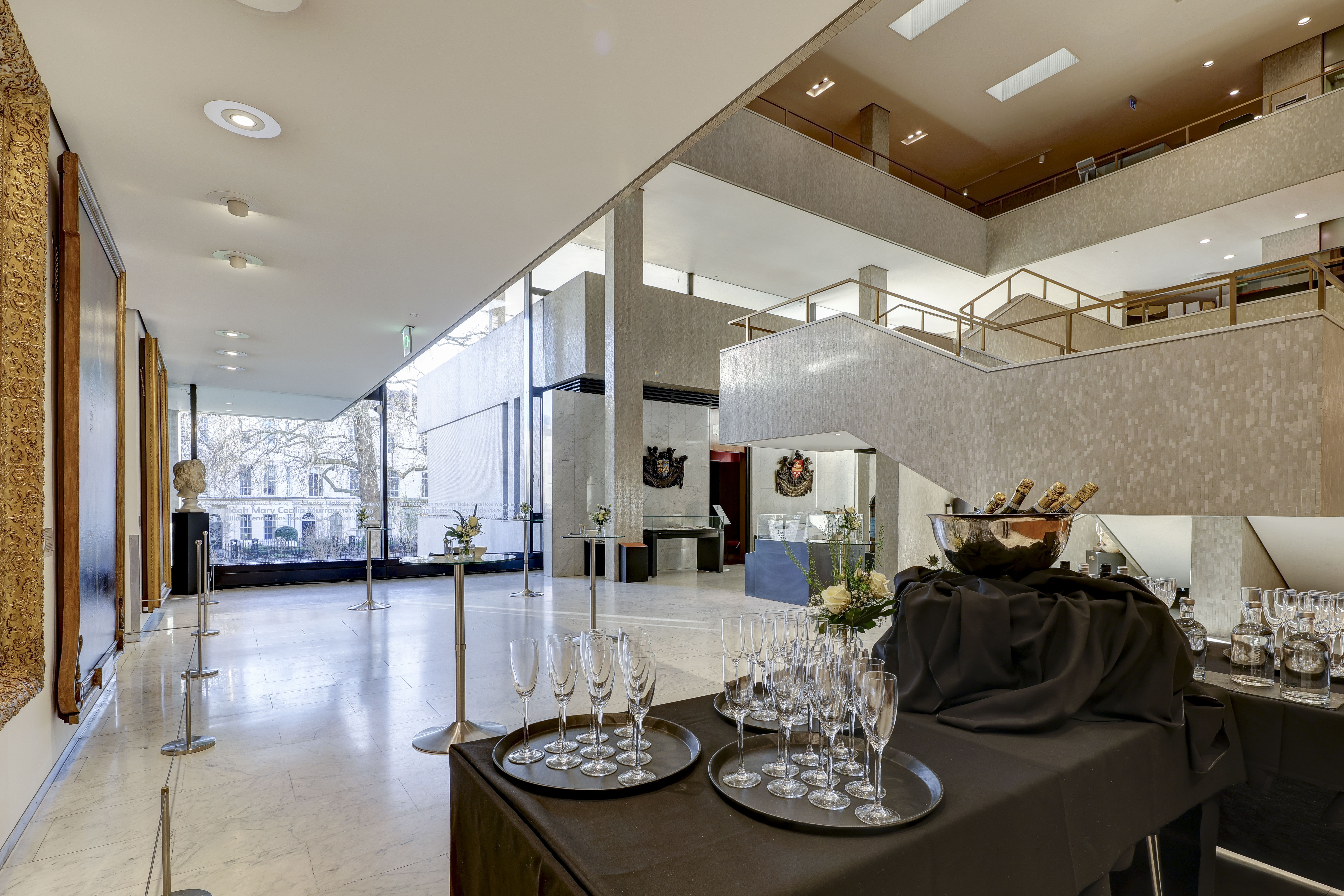 Filming at RCP London Events: modern event space with champagne flutes for upscale receptions.