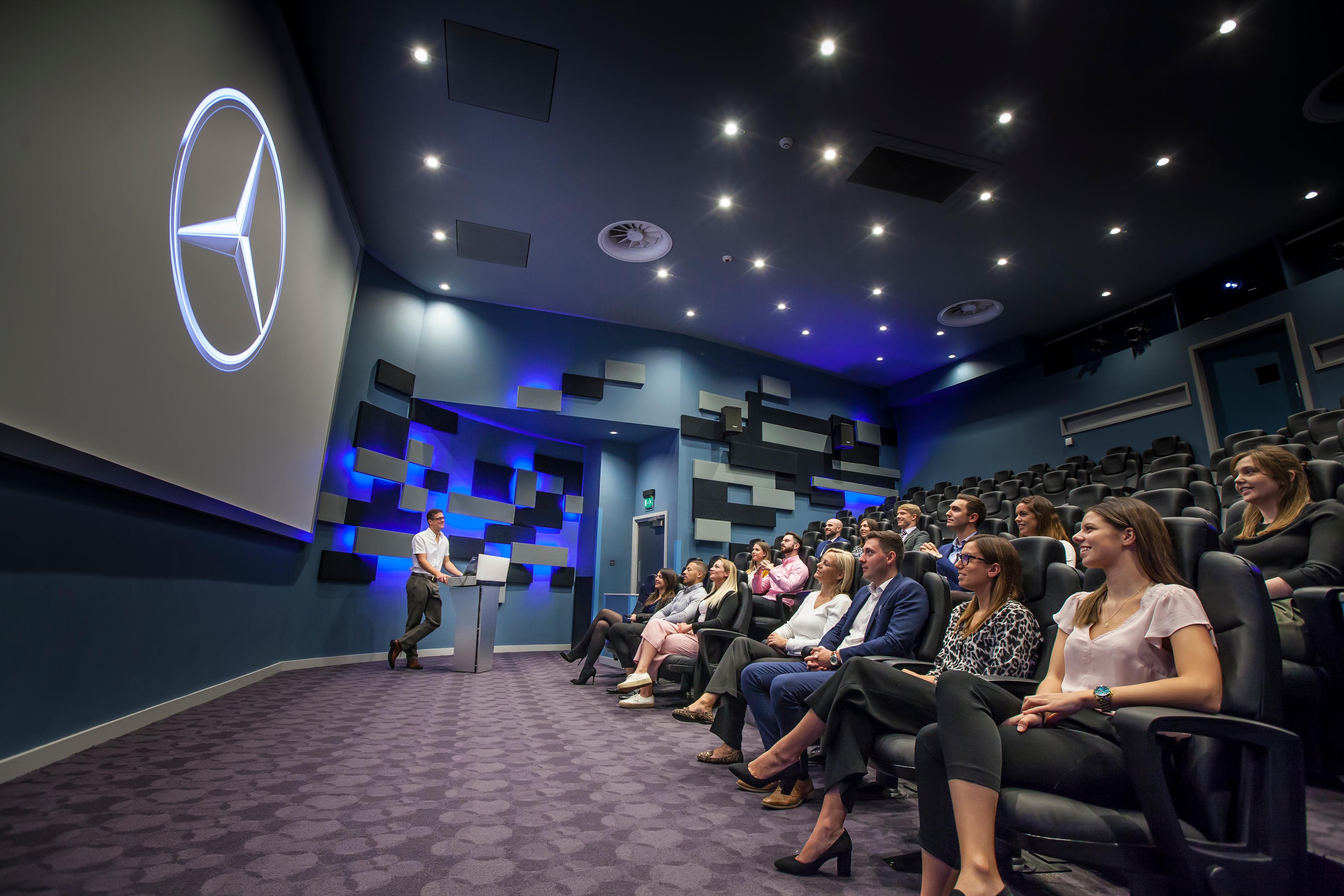 Modern conference room at Mercedes-Benz World for corporate presentations and training.
