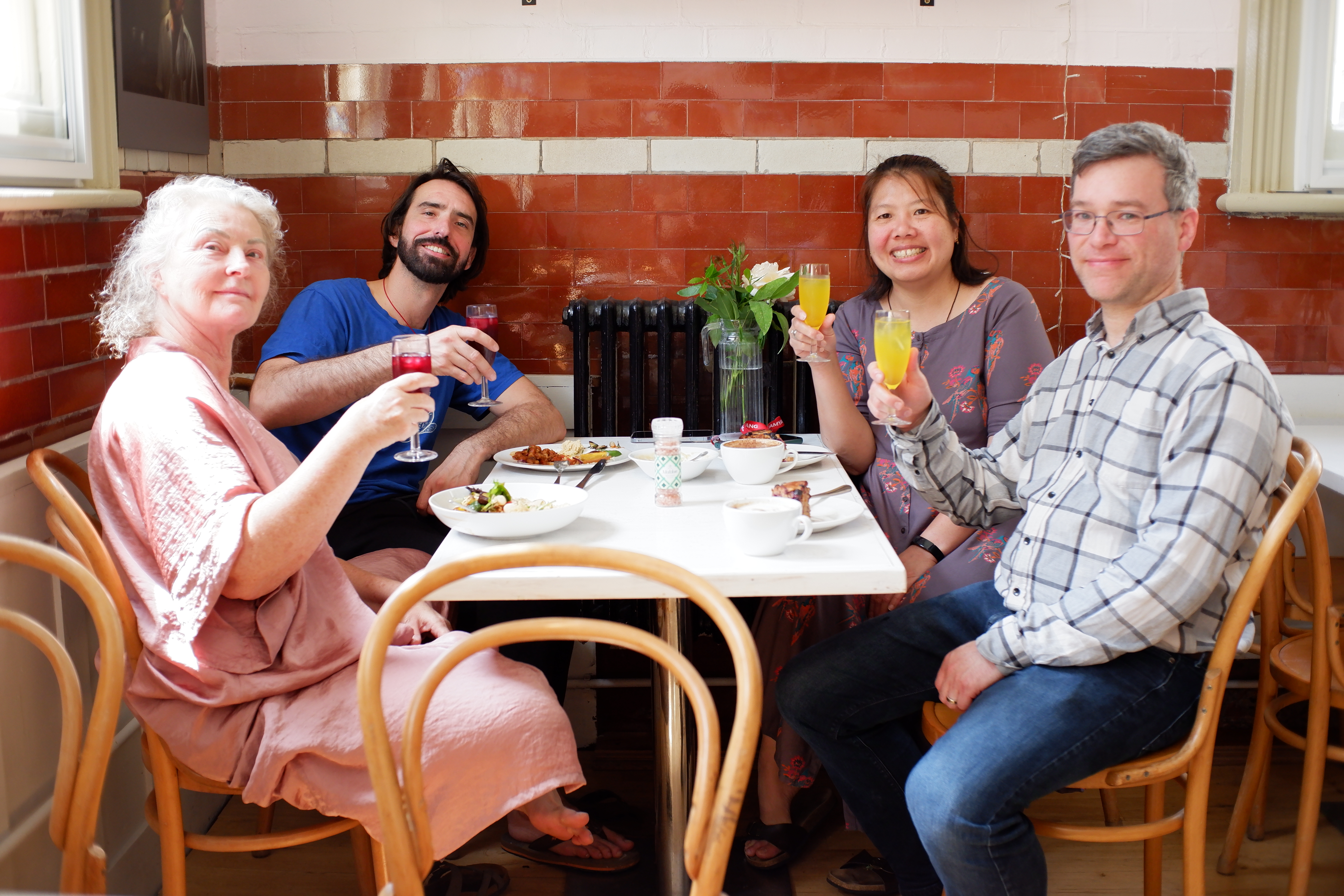 Cozy brunch gathering at Jamyang Buddhist Centre Cafe for team-building events.