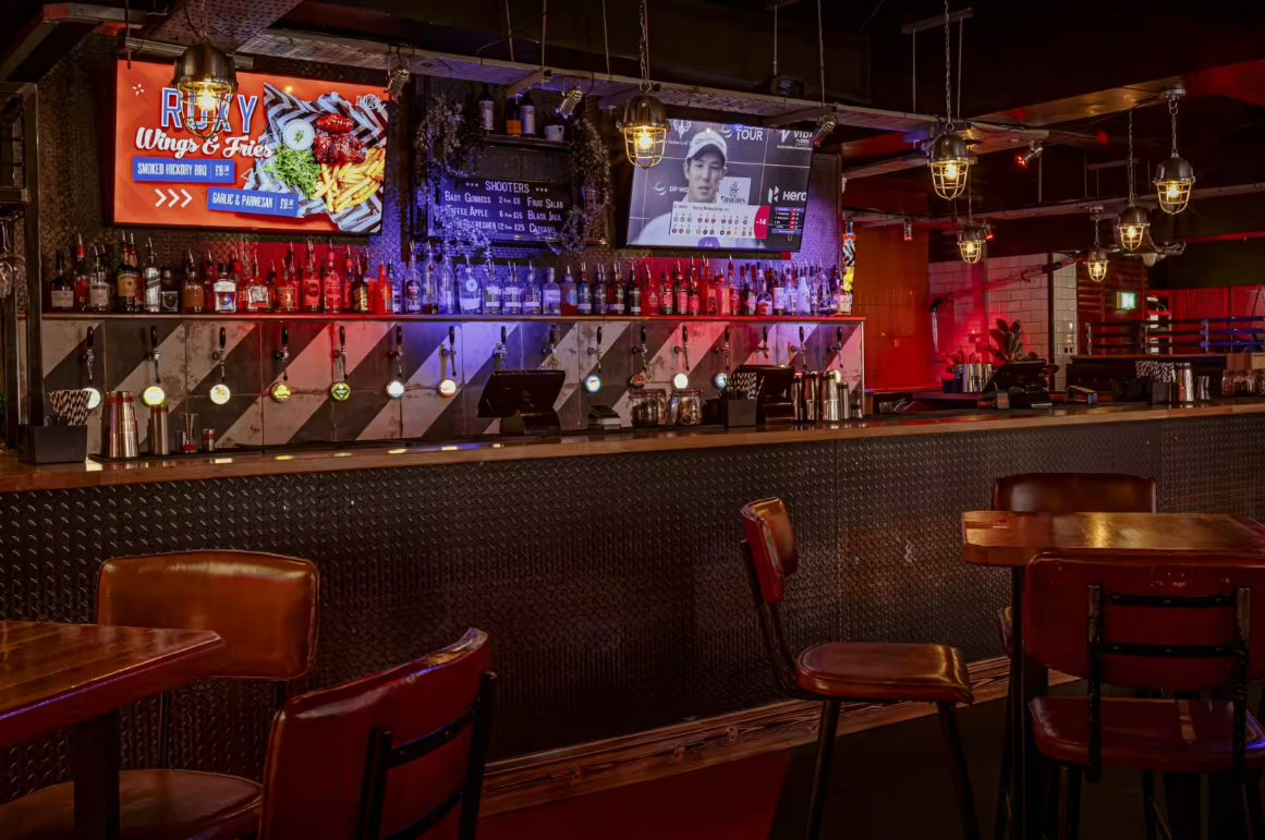 Modern bar setup in Roxy Ball Room for informal meetings and networking events.