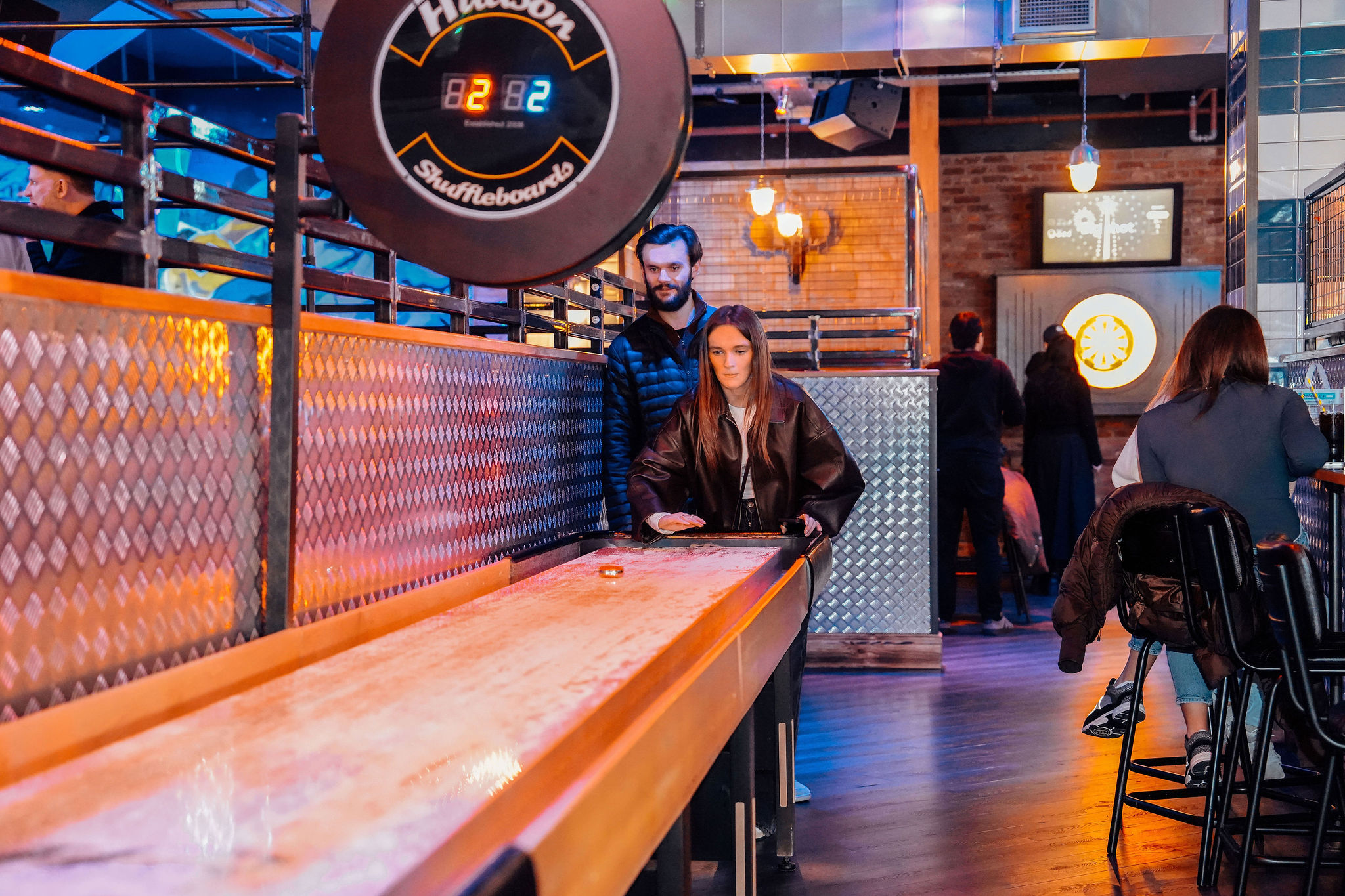 Star Pins Liverpool venue hire with shuffleboard for corporate team building and networking.