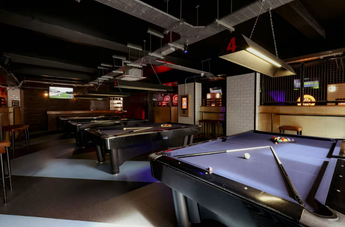 Vibrant billiards venue at Roxy Ball Room for team-building and casual networking events.