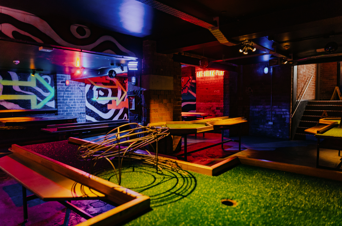 Vibrant Roxy Ball Room venue with neon lights for informal corporate events in Leeds.