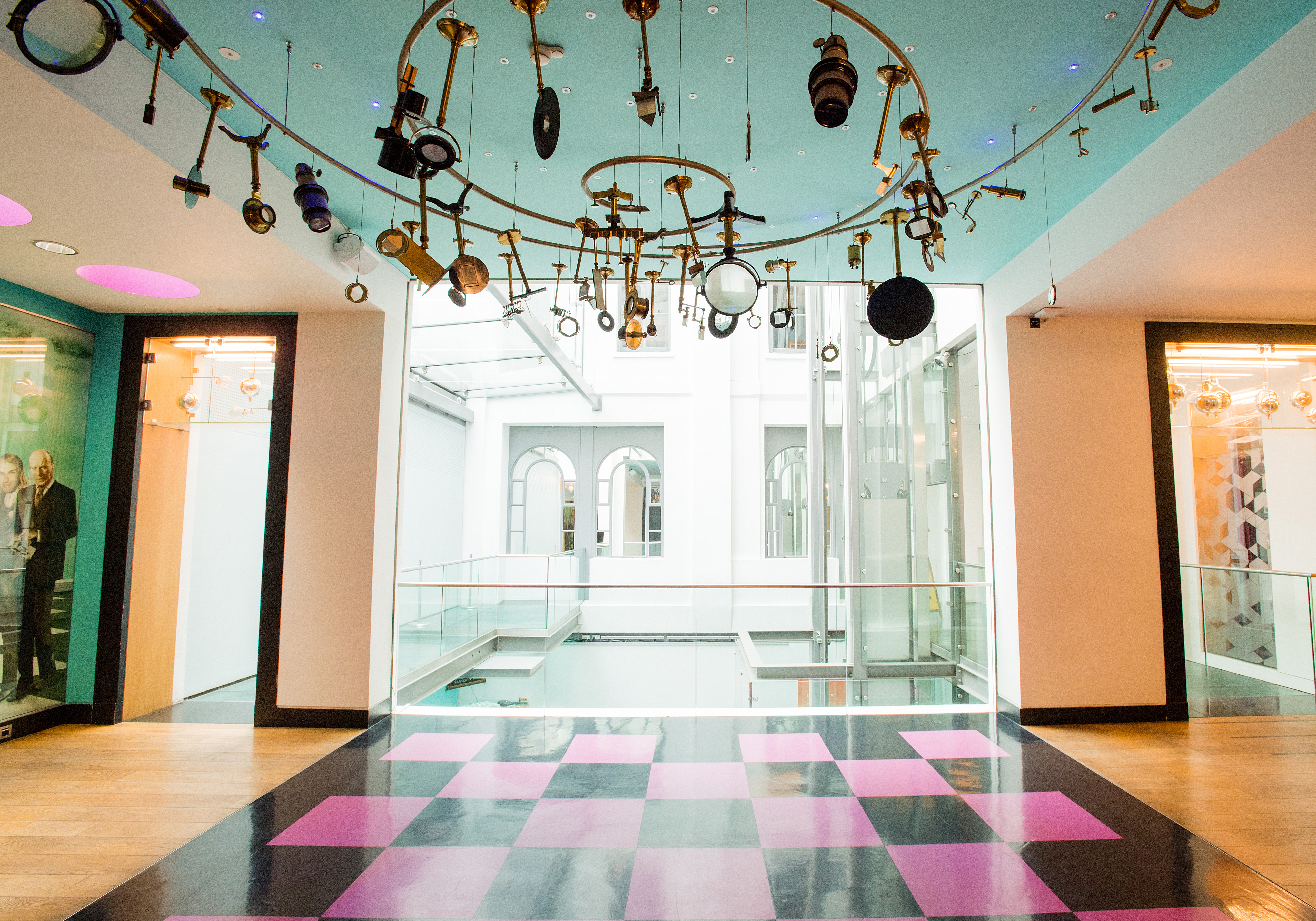 Modern event space with artistic ceiling lights at Royal Institution Venue.