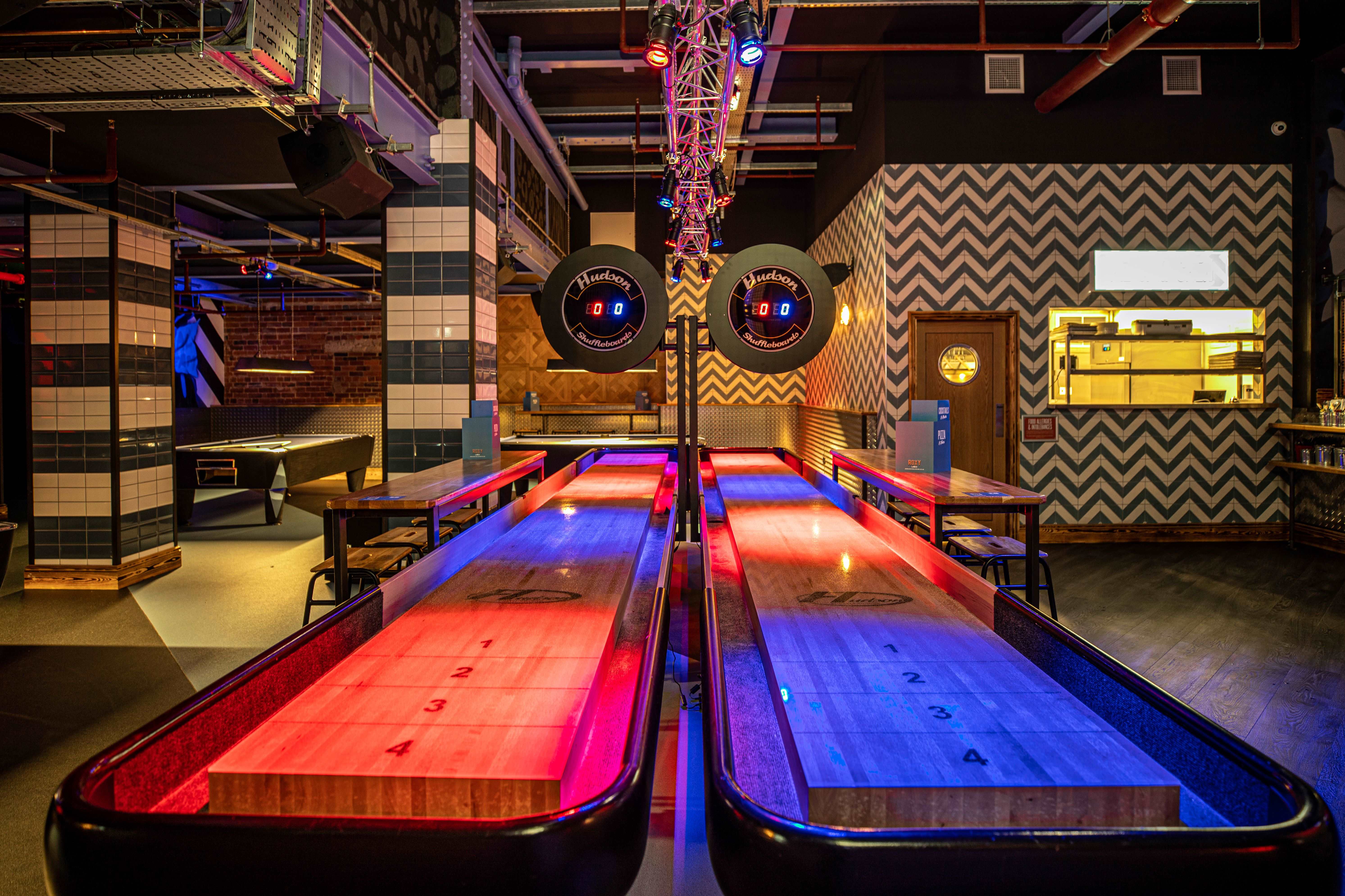 The Gaming Hall in Roxy Lanes, Leeds: modern shuffleboard tables for corporate events.