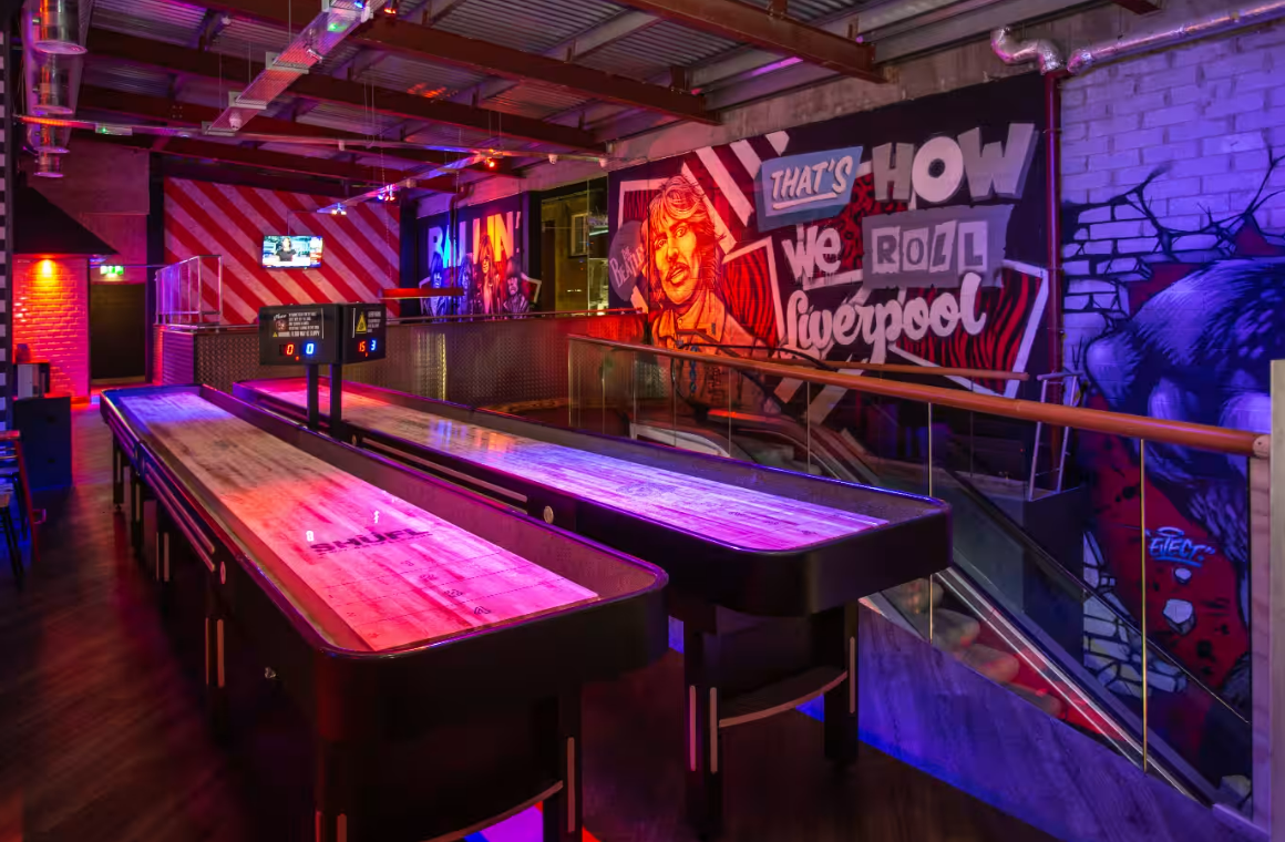 Vibrant Roxy Ball Room venue with shuffleboard tables for events in Liverpool.