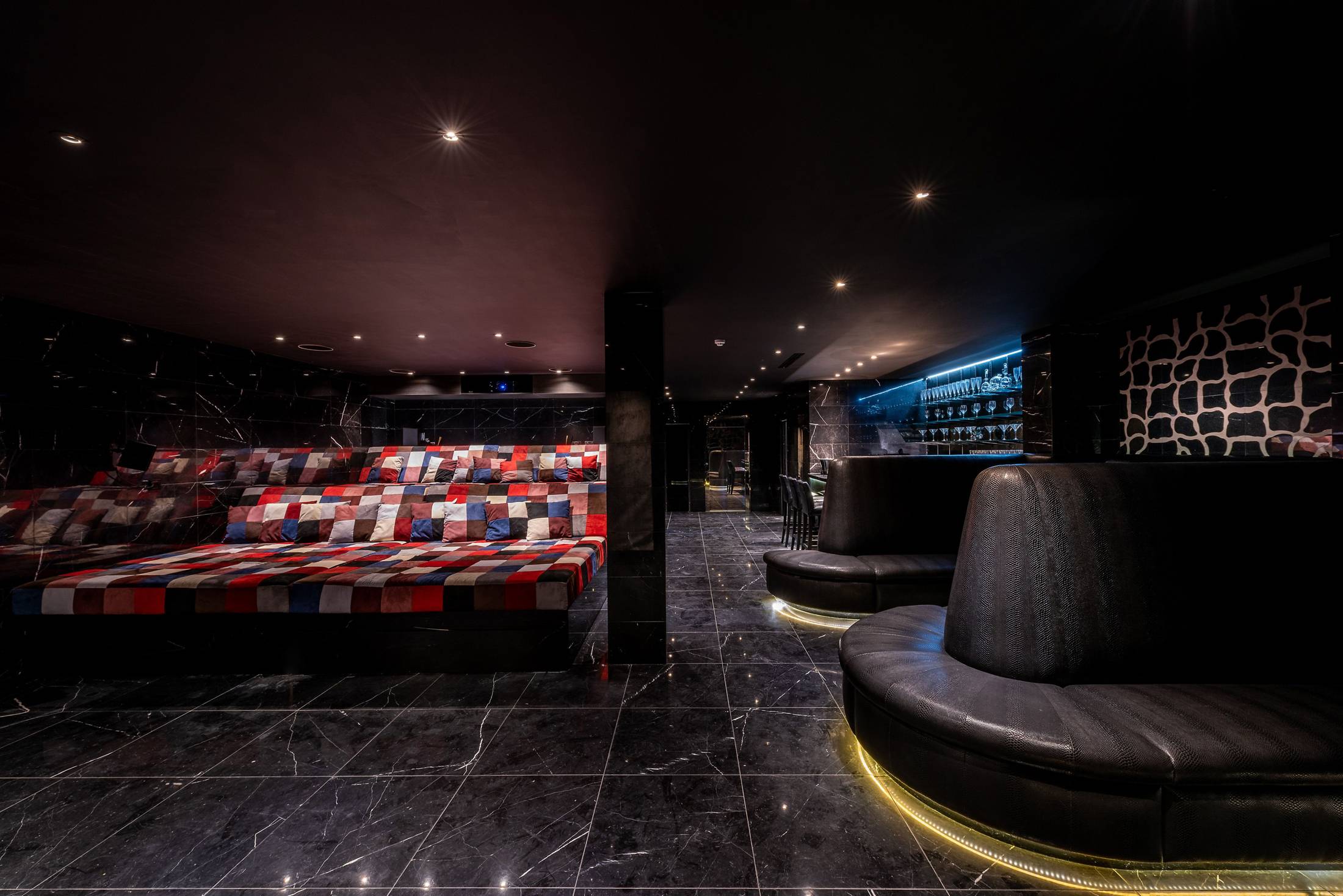 VIP networking lounge at The Cinema Bar, Lumiere London with moody lighting for cocktail receptions.