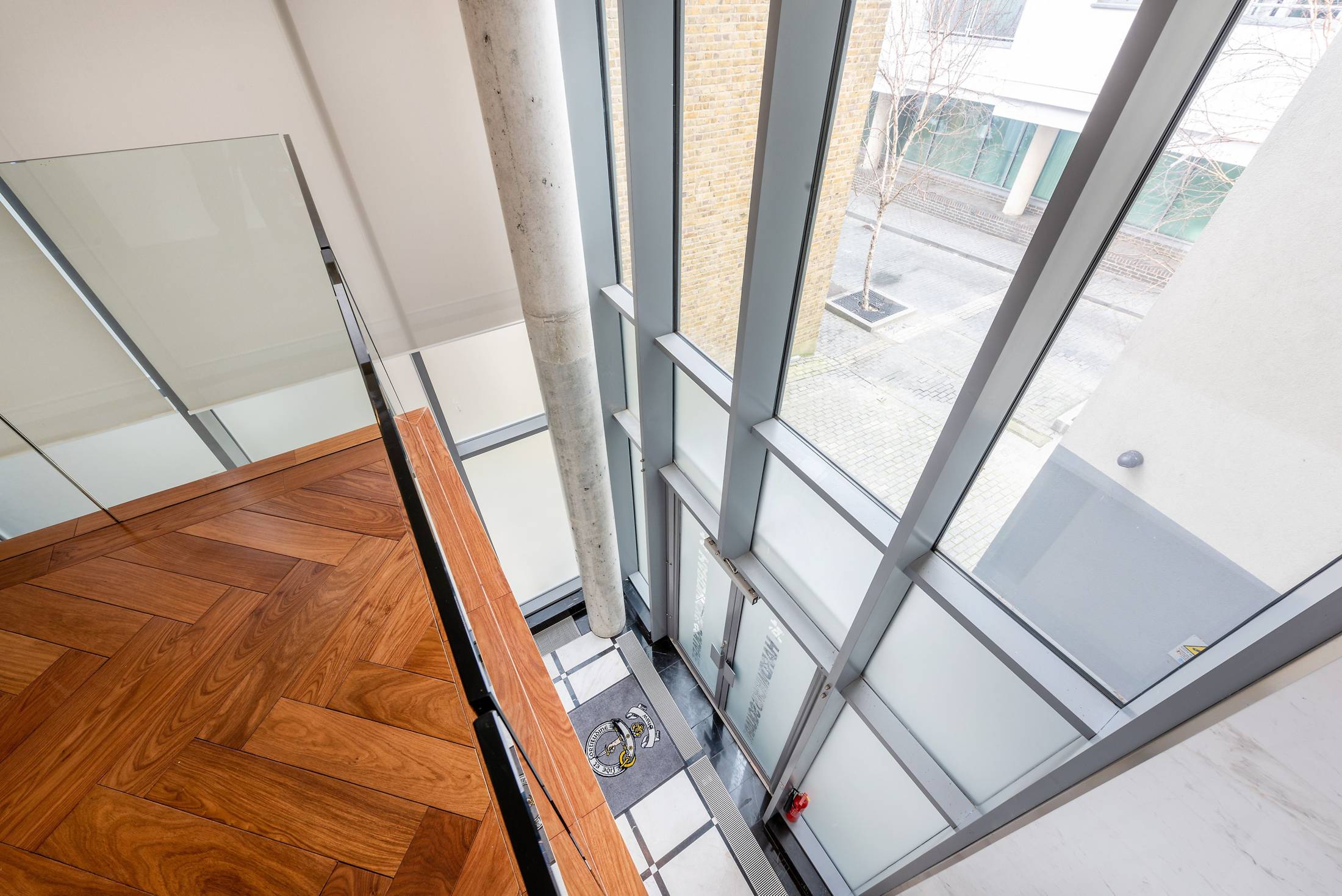 The Cinema Bar atrium at Lumiere London, a modern event space for cocktail receptions.