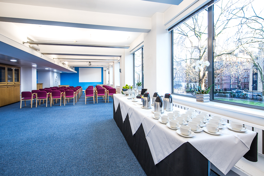 BJA Library meeting space with natural light, perfect for conferences and workshops.