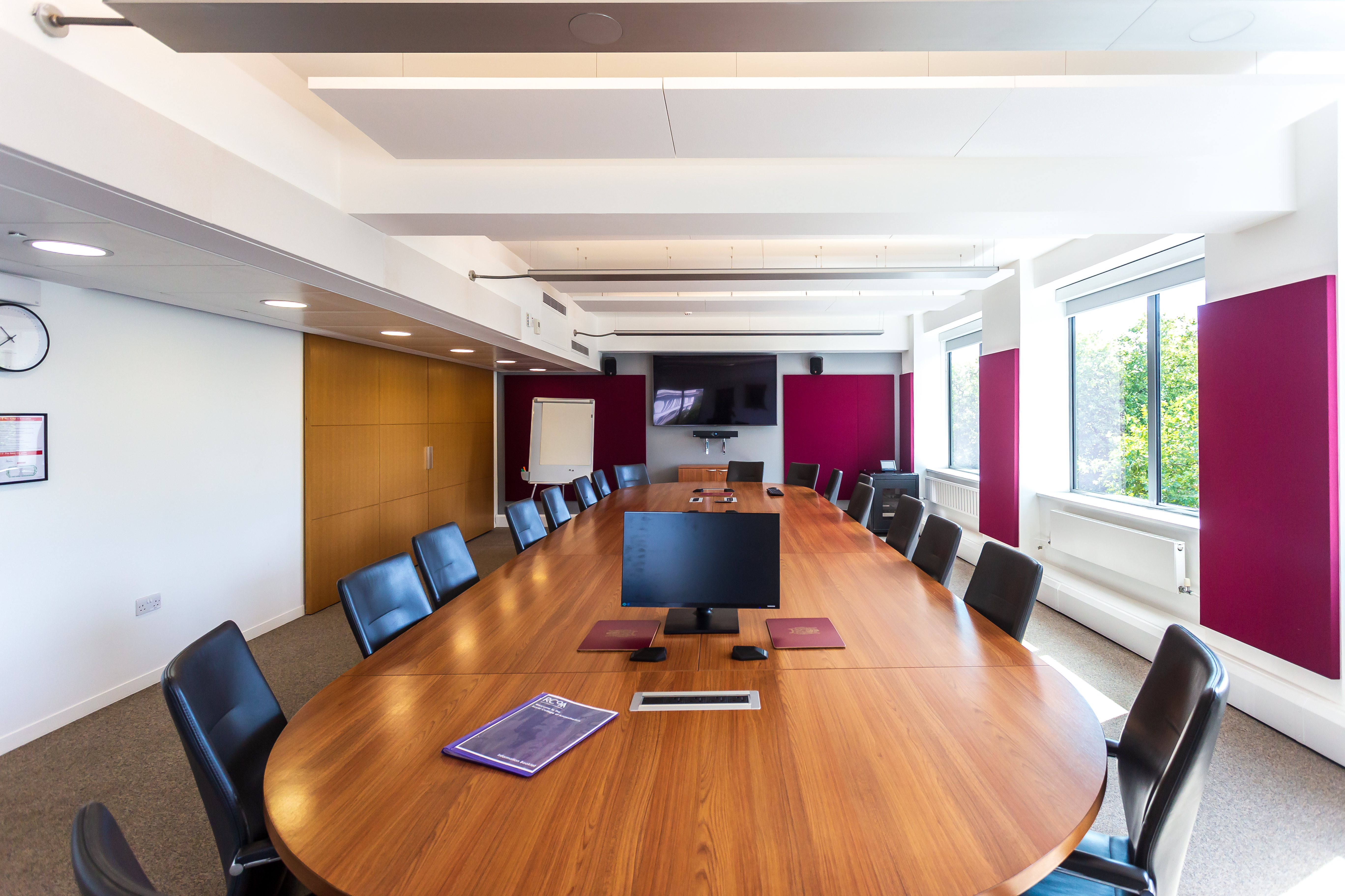 Modern conference room with wooden table at Royal College of Anaesthetists for events.