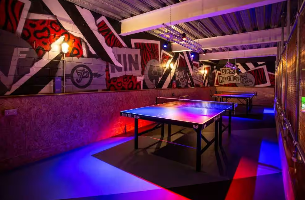 Vibrant event space with ping pong tables at Roxy Ball Room, Liverpool for networking or team-building.