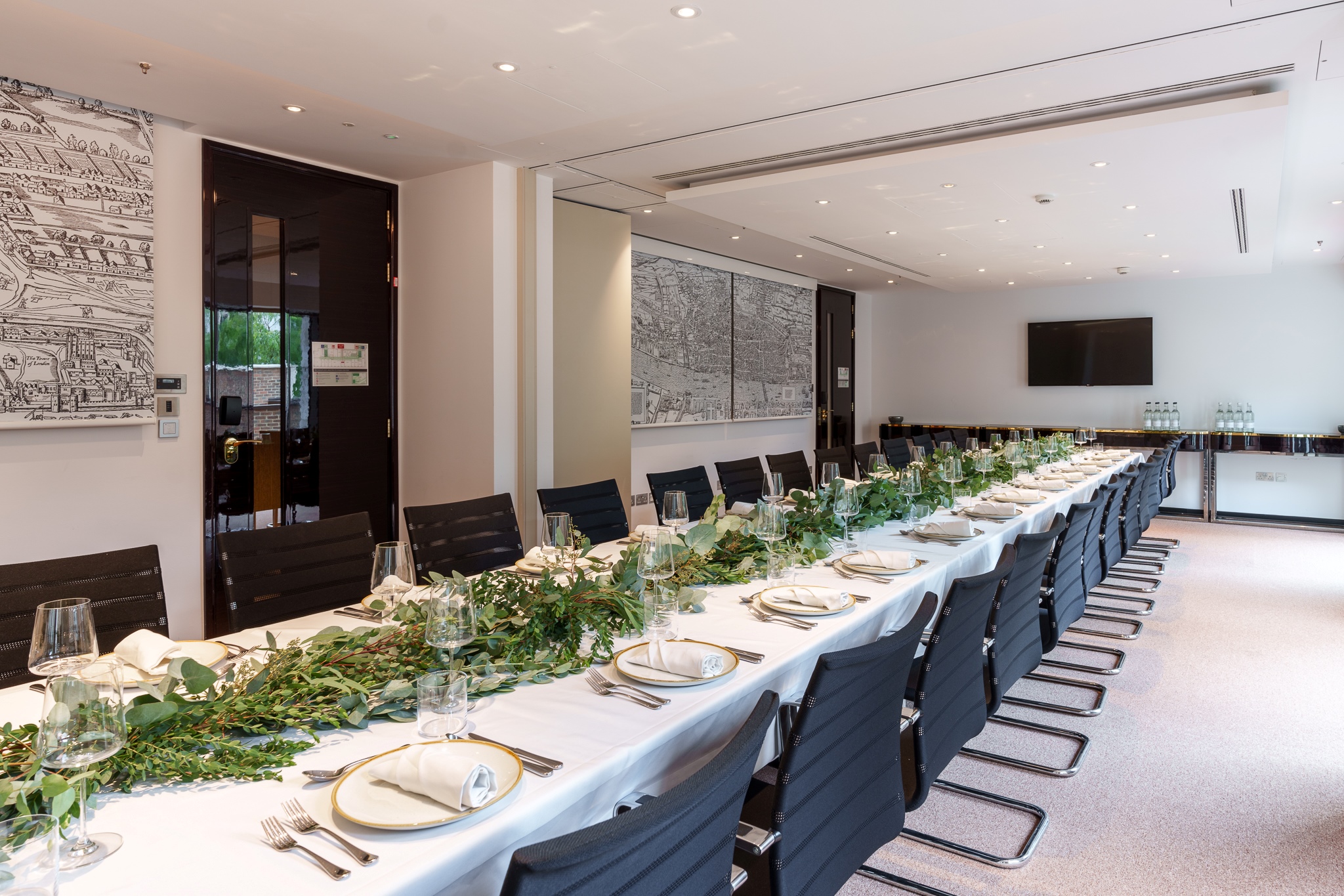 Aldgate Suite at Hotel Saint London, ideal for corporate meetings with elegant table settings.