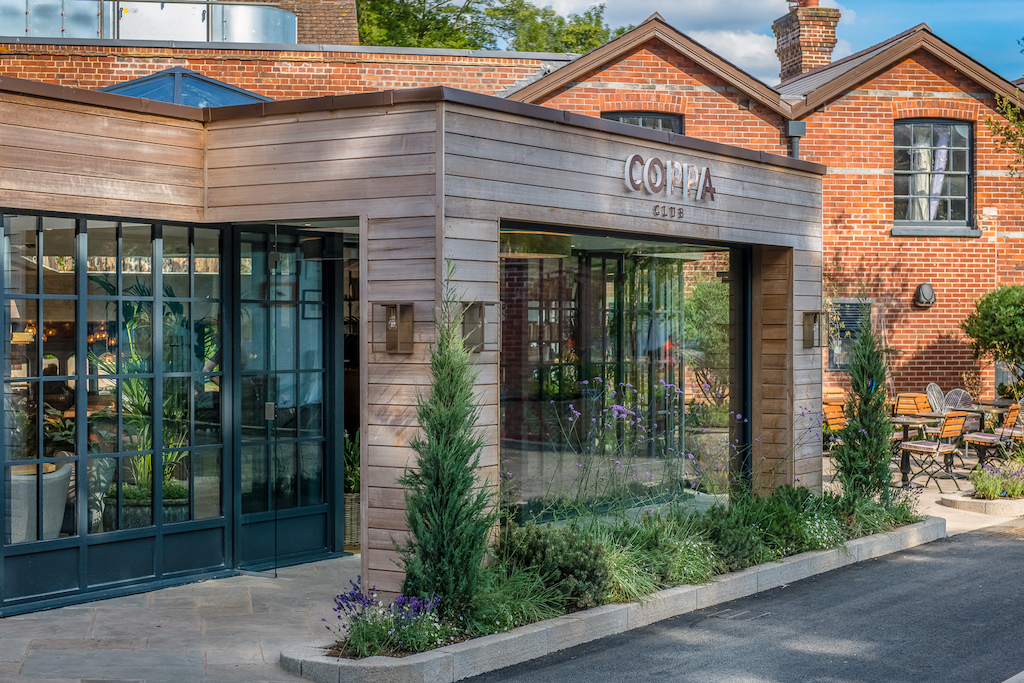 Modern industrial venue at Coppa Club Streatley, perfect for upscale corporate networking events.