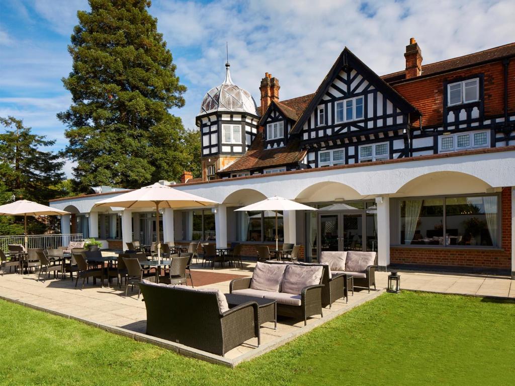 Patio breakout space at Macdonald Berystede Hotel, ideal for corporate retreats and networking.