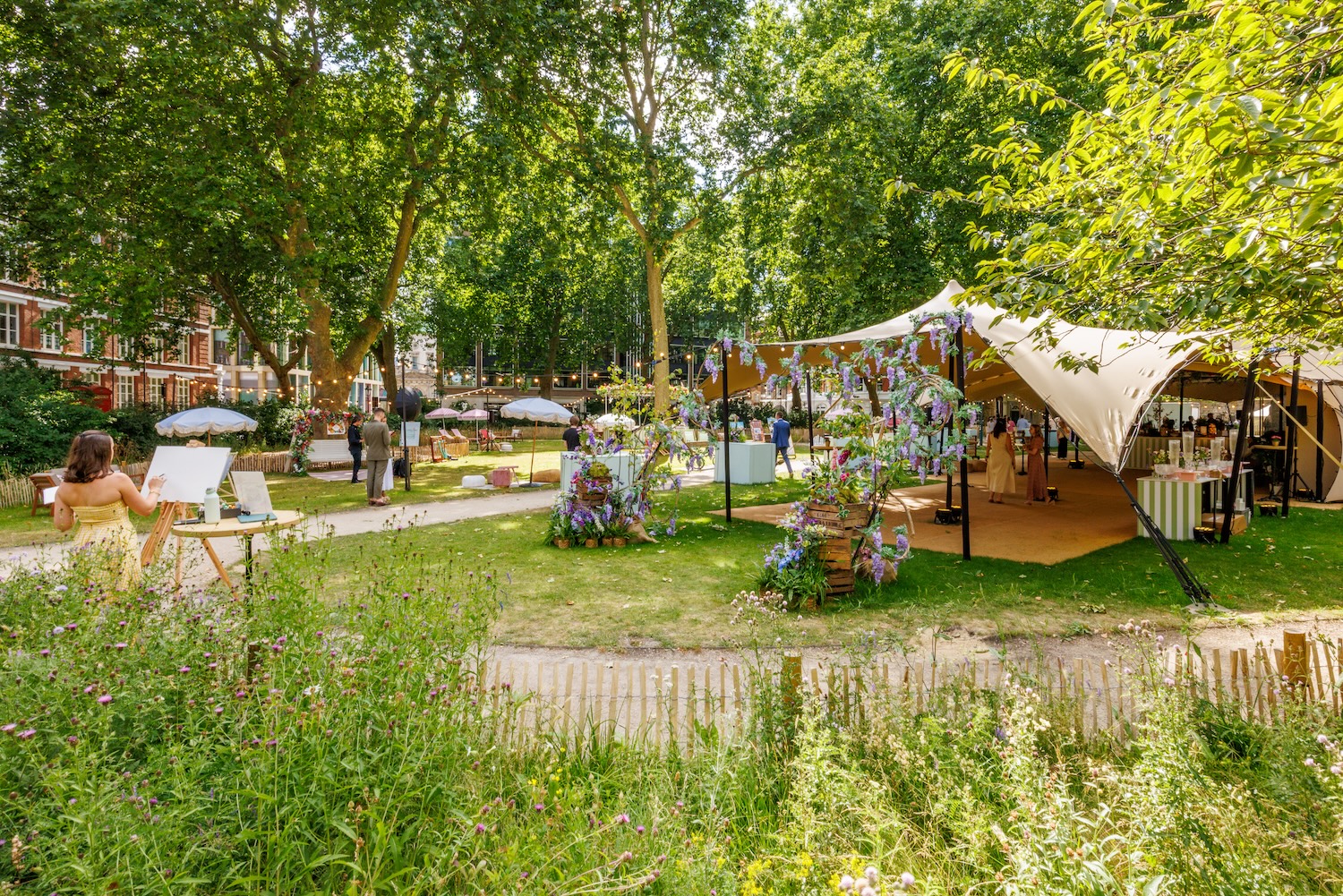Outdoor summer party tent in lush Charterhouse Square, ideal for creative events.