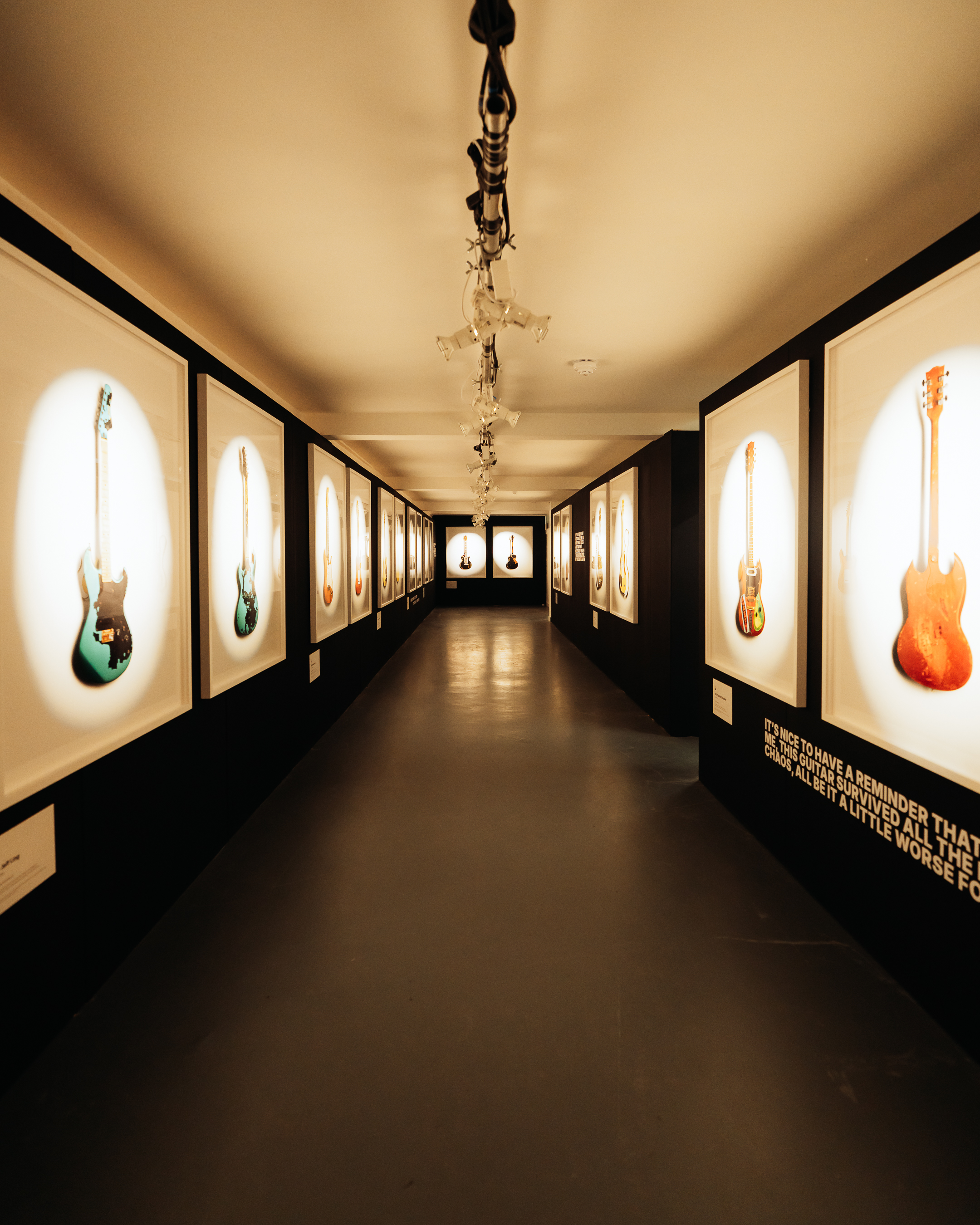 Artful guitar display in UNLOCKED SHOREDITCH, ideal for creative events and music conferences.