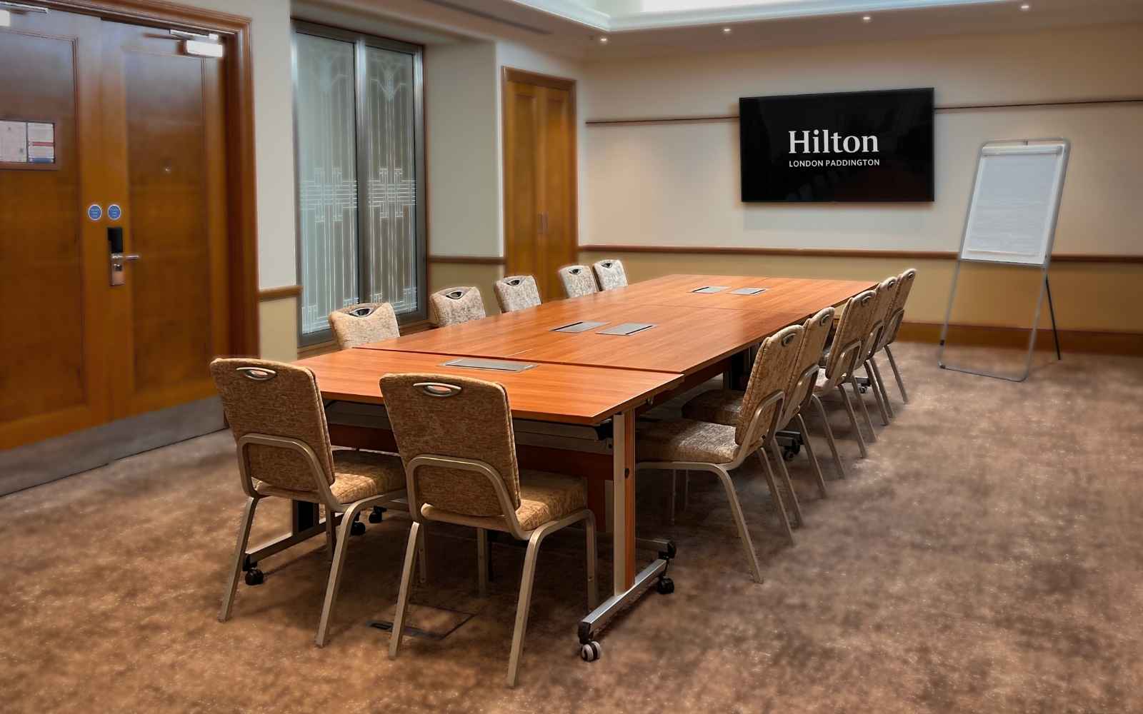 Redstar meeting room at Hilton London Paddington, ideal for corporate events and workshops.