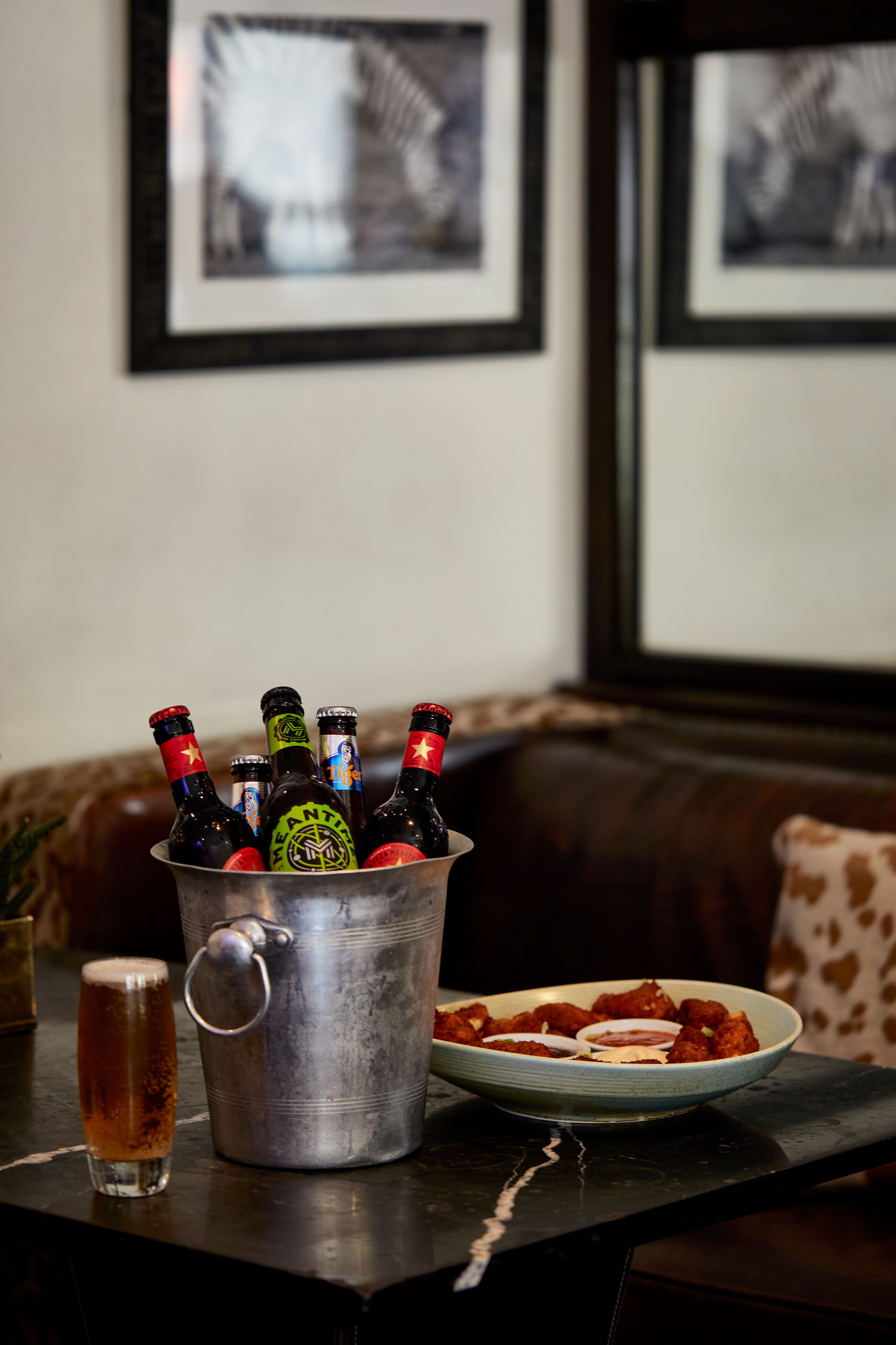 Stylish ice bucket with craft beers for events and gatherings at bbar venue.