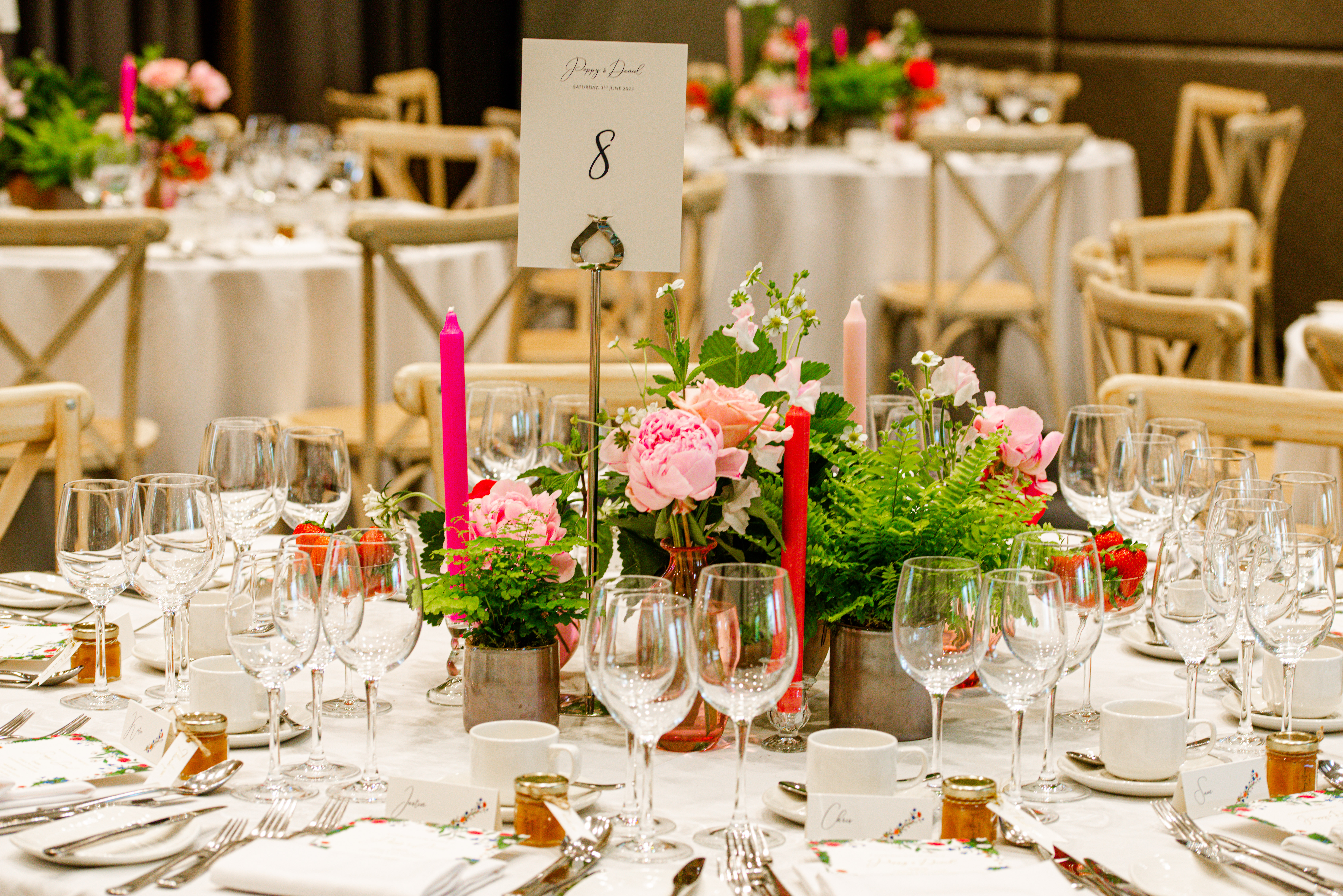Elegant banquet table with floral centerpieces at RCP London Events.